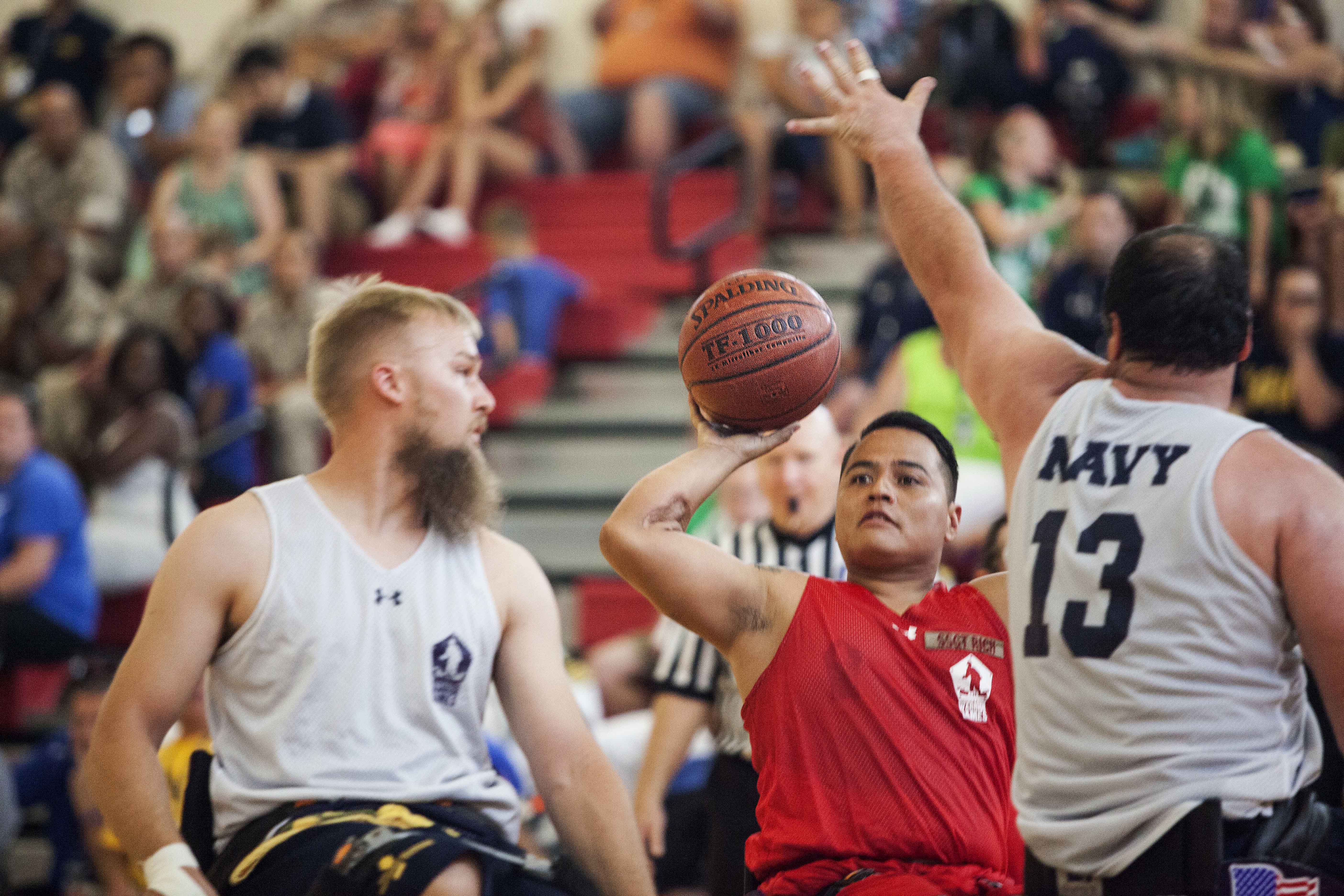 U S Marine Corps Veteran Marcus Chischilly Prepare To Pass The Ball During The Wheelchair Basketball Championship