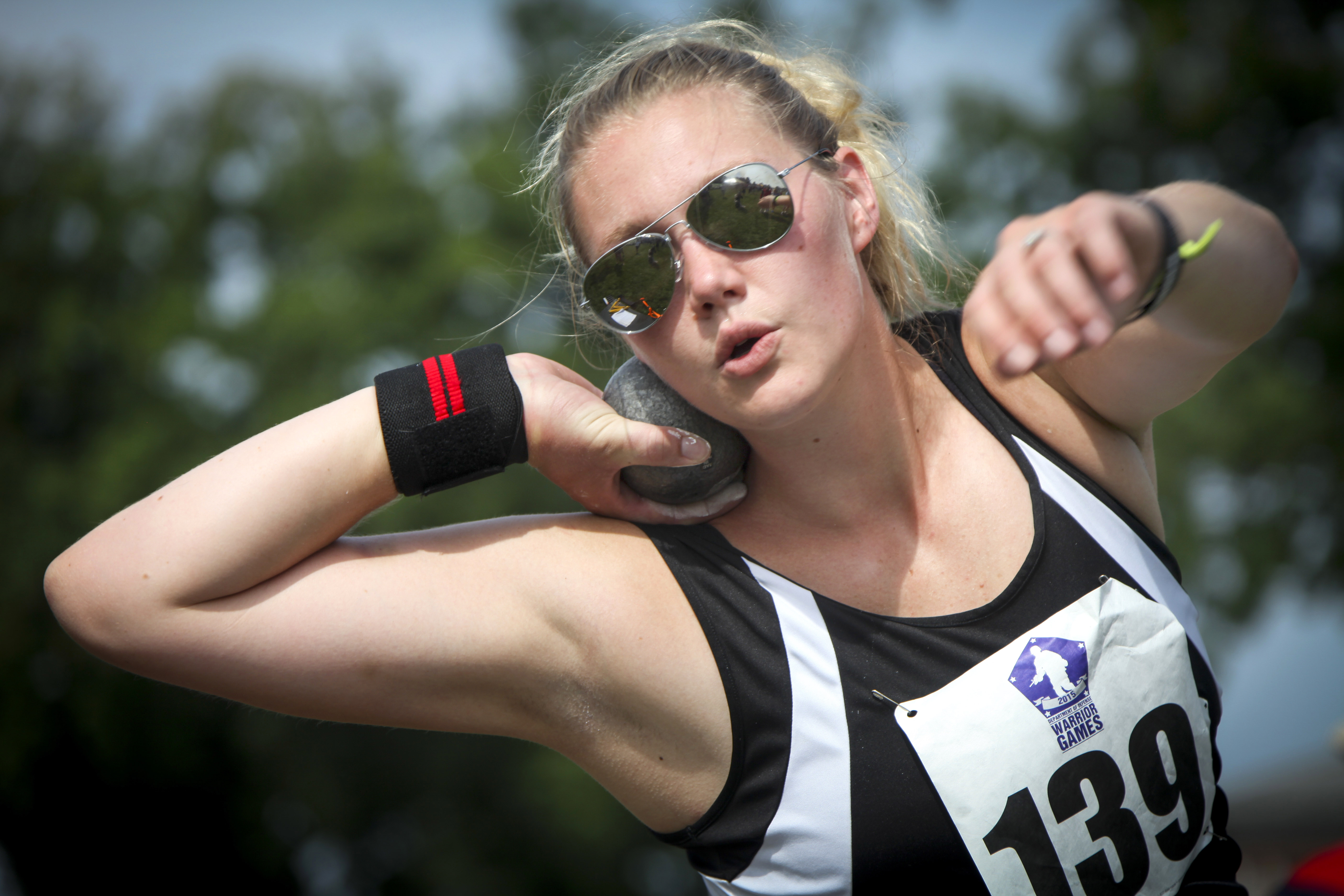 A U.S. Army athlete competes in the shot put event at the 2015 Department of Defense Warrior
