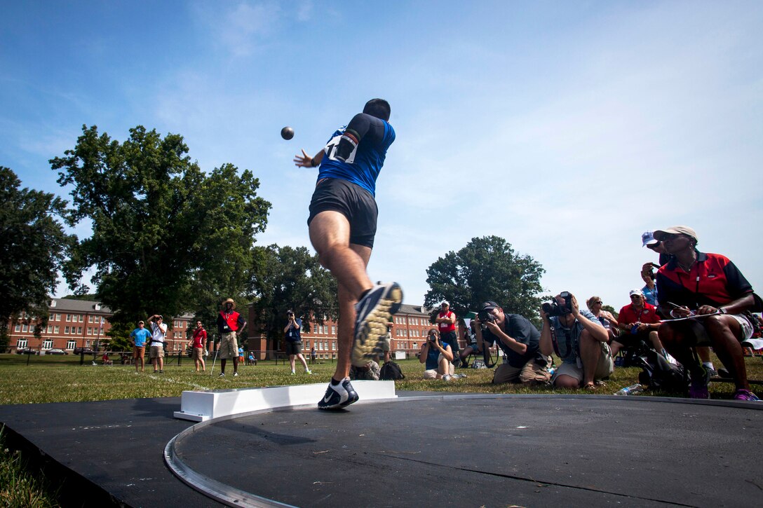 A U.S. Air Force athlete competes in the shot put event at the 2015 Department of Defense Warrior Games on Marine Corps Base Quantico, Va., June 23, 2015.