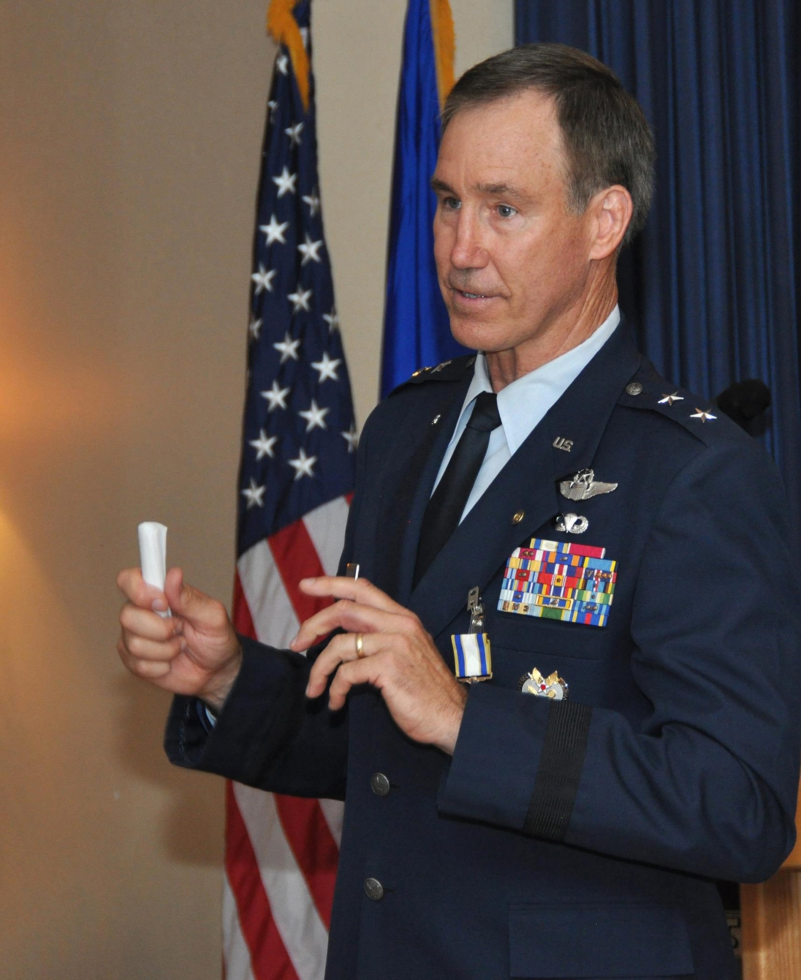 Maj. Gen. Craig Gourley (right) received his Distinguished Service Medal June 5 during his retirment ceremony at the Naval Air Station Fort Worth Joint Reserve Base, Texas. Gourley served as the Deputy Inspector General of the Air Force, Office of the Secretary of the Air Force, Washington, D.C. Prior to that he was the vice commander for Air Force Reserve Command at Robins Air Force Base, Ga. He retired after 37 years of service to his country. (U.S. Air Force photo by Master Sgt. Julie Briden-Garcia)