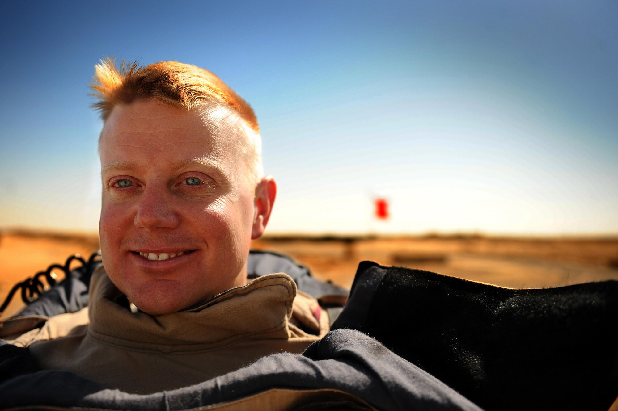 Tech. Sgt. Matthew Bingaman, 386th Expeditionary Civil Engineer Squadron explosive ordnance disposal technician, prepares to manually approach an improvised explosive device during a training scenario at an undisclosed location in Southwest Asia, June 25, 2015. Bingaman has been in the Air Force for 16 years and has deployed six times. (U.S. Air Force photo/Tech. Sgt. Brittany E. Jones) 