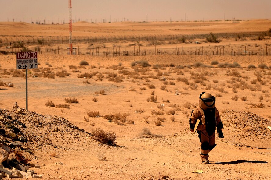 Tech. Sgt. Matthew Bingaman, 386th Expeditionary Civil Engineer Squadron explosive ordnance disposal technician, returns from a manual approach to an improvised explosive device training scenario at an undisclosed location in Southwest Asia, June 25, 2015. Even as a 16-year EOD veteran, Bingaman continually trains to safely handle live explosives. (U.S. Air Force photo/Tech. Sgt. Brittany E. Jones)