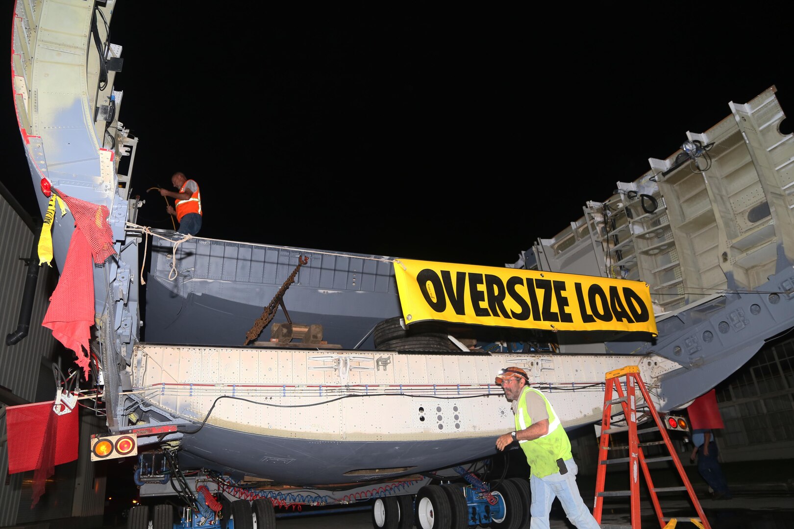 A C-17 Globemaster II fuselage began its journey from the 502nd Trainer Development Squadron at Joint Base San Antonio-Randolph June 23, 2015.  Since its arrival via flatbed truck in 2011, the fuselage was transformed into the Air Force’s first fully functioning aeromedical evacuation trainer.  The C-17 will be used to train more than 1,300 flight nurses, aeromedical technicians, critical care physicians, intensive care nurses, respiratory nurses and flight surgeons annually at the U.S. Air Force School of Aerospace Medicine at Wright Patterson Air Force Base, Ohio. The fuselage is the last piece to be delivered and its trek will take about 10 days and then reassembly begins.

