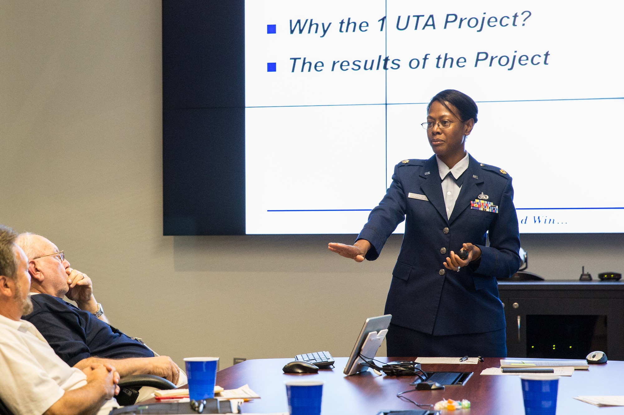 Maj. Kimberly Champagne speaks to members of the American Society for Quality Charleston Section June 23, 2015 about lean processes and project management tools used to save hundreds of thousands of dollars in salary and per-deim funds. ASQ Charleston strives to provide first-rate development opportunities for quality professionals, and Champagne’s leadership resulted in improved quality performance standards and approximately $100,000 in savings monthly. Champagne is the 315th Airlift Wing process manager at Joint Base Charleston, S.C. (U.S. Air Force photo by Tech. Sgt. Shane Ellis)