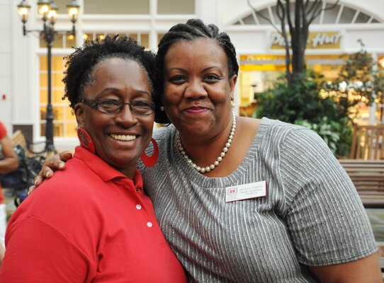 From left: Paula Hanna, Savannah District’s family readiness coordinator and executive secretary for Savannah District’s deputy commander, and a USO staff member take a break after welcoming home the 542nd FEST-A team at the Savannah-Hilton Head International airport, June 23.