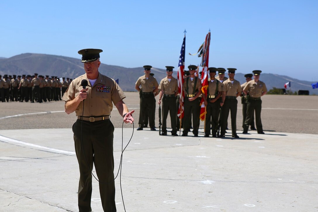 Colonel Kenneth R. Kassner speaks after taking command of the 5th Marine Regiment from Col. Jason Q. Bohm aboard Marine Corps Base Camp Pendleton, Calif., June 24, 2015. Kassner most recently served as the assistant chief of staff, programming and requirements, U.S. Marine Corps Forces Special Operations Command.