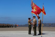 Colonel Jason Q. Bohm relinquishes his role as the commanding officer of the 5th Marine Regiment to Col. Kenneth R. Kassner aboard Marine Corps Base Camp Pendleton, Calif., June 24, 2015. Kassner most recently served as the assistant chief of staff, programming and requirements, U.S. Marine Corps Forces Special Operations Command.