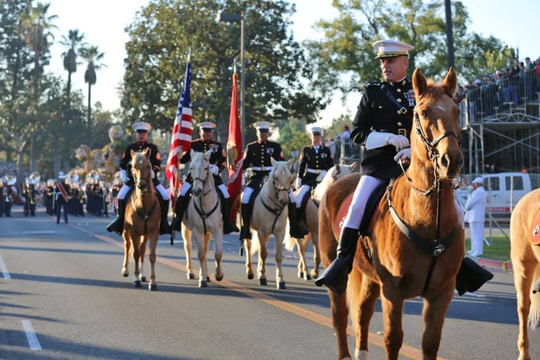 Col. Michael L. Scalise, base commander for Marine Corps Logistics Base Barstow, Calif., rides in the Tournament of Roses Parade in Pasadena, Calif., January 2013 with the MCLB Barstow Mounted Color Guard. Learning to ride horses and participating in the Marine Corps' only Mounted Color Guard is one of Col. Scalise's favorite memories as he relinquishes command of the base on July 1 to Col. Sekou S. Karega and moves on to Camp Lejeune, N.C., to assume duties as the G-4 for Marine Corps Installations East at the general staff level.
