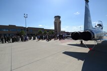 Members of Team XL celebrate Col. Brian Hastings’, 47th Flying Training Wing commander, final flight here at Laughlin Air Force Base, Texas, June 25, 2015. In preparation for Hasting’s change of command ceremony set to occur on Monday, June 29, he completed his “fini flight” with Lt. Col. Joshua Lechowick, 47th Operations Group deputy commander, in the T-38 Talon. (U.S. Air Force photo by Airman 1st Class Ariel D. Partlow)