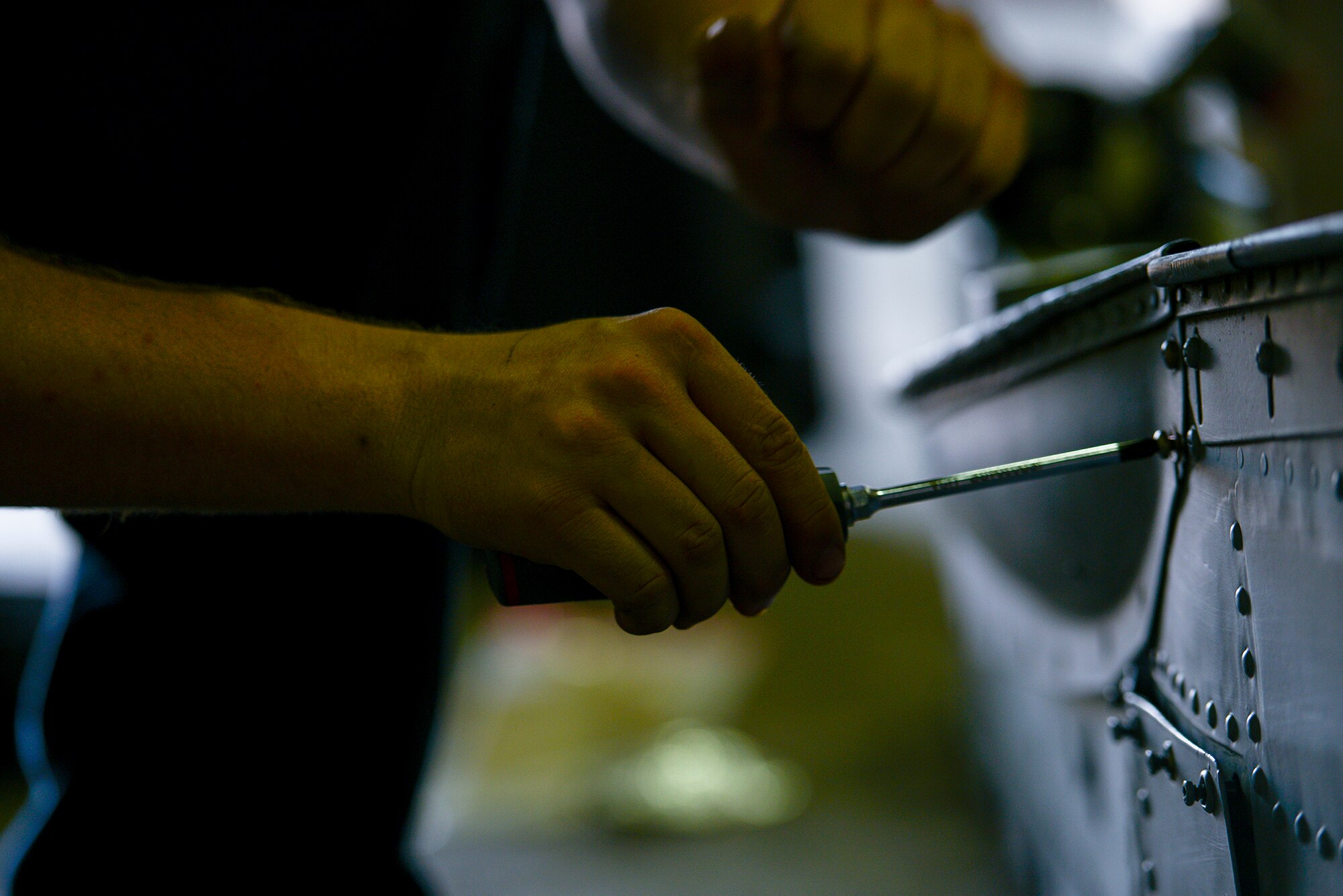Staff Sgt. Christopher Simison, 25th Aircraft Maintenance Unit weapons load team chief, works on an A-10 pylon June 22, 2015, at Osan Air Base, Republic of Korea. The A-10 has 11 pylons, which allows the plane to have external storage capabilities. (U.S. Air Force photo by Staff Sgt. Jake Barreiro/Released) 