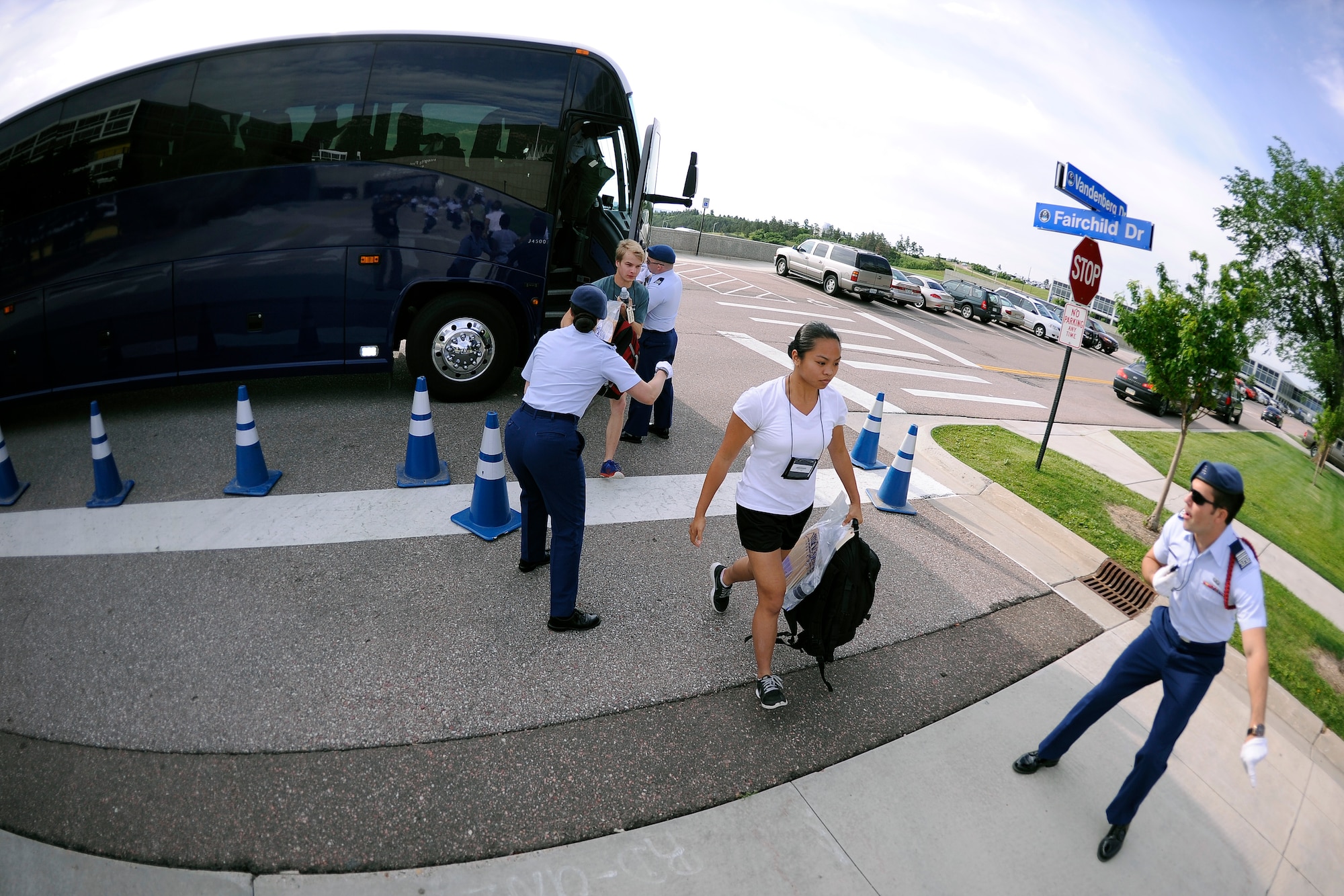 Basic cadet training cadre members direct newly arriving basic cadets toward the Core Values Ramp at the U.S. Air Force Academy as they get off a bus to begin BCT June 25, 2015. (U.S. Air Force photo/Bill Evans)