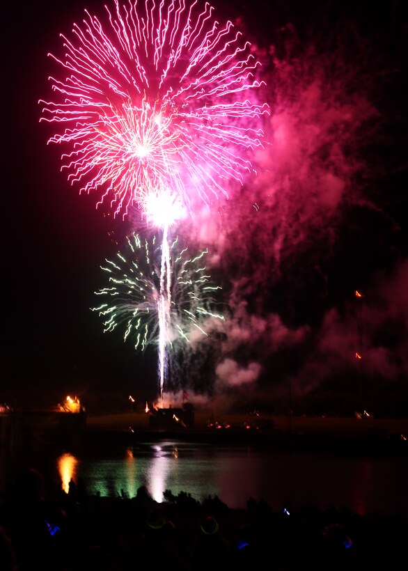 Fireworks shoot off over Stennis Lock and Dam at the 2013 Fireworks on the Water event in Columbus, Mississippi. Fireworks on the Water, a free and open to the public event occurring July 4, is sponsored by the Columbus community and Columbus Air Force Base in order to honor our nation’s independence. (U.S. Air Force photo)