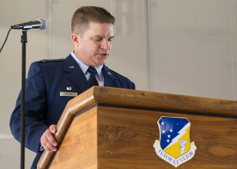 Colonel Greg Brown, 49th Mission Support Group commander, gives a speech welcoming the new Civil Engineer Squadron commander during the 49th CES Assumption of Command ceremony at Holloman Air Force Base, N.M., June 25, 2015. During the ceremony, Aydin Budak, acting commander of the 49th CES, relinquished command to Lt. Col. Kevin Mares. (U.S. Air Force photo by Airman 1st Class Emily A. Kenney/Released) 