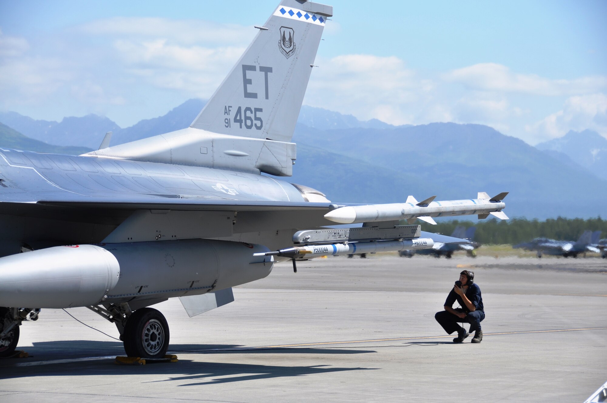 Senior Airman Jeremy Fogle, 96th Aircraft Maintenance Squadron F-16 crew chief from Nazareth, Pa., prepares his F-16 for launch for an Exercise Northern Edge mission June 23, 2015. Northern Edge is Alaska’s premier joint training exercise designed to practice operations, techniques and procedures as well as enhance interoperability among the services. Thousands of service members from active duty, Reserve and National Guard units are involved.  (U.S. Air Force photo/Capt. Tania Bryan)
