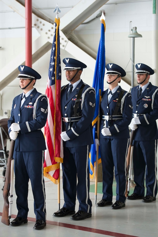 The Joint Base Charleston honor guard prepares to present the colors at the beginning of the 17th Airlift Squadron's inactivation ceremony June 25, 2015 at Joint Base Charleston, S.C. As part of the President’s Defense Budget for FY15, one of Charleston’s four active-duty C-17 flying squadron's was designated for inactivation. In attendance at the ceremony were many of the squadron's former commander's including Maj. Gen. (ret) Ron Ladnier, who commanded the squadron when it stood up as the first operational C-17 squadron. (U.S. Air Force photo / Trisha Gallaway) 