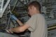 Staff Sgt Nicholas Hall, a member of the Pneudraulics shop in the 126th Maintenance Squadron assigned to the 126th Air Refueling Wing, repairs portions of hydraulic lines on a KC-135R Stratotanker during a 900 hour inspection at Scott Air Force Base, Ill., June 17, 2015. The aircraft just returned from a tour overseas with members of the Illinois Air National Guard’s 126th Air Refueling Wing. (Air National Guard photo by Staff Sgt. Brooke Culler)