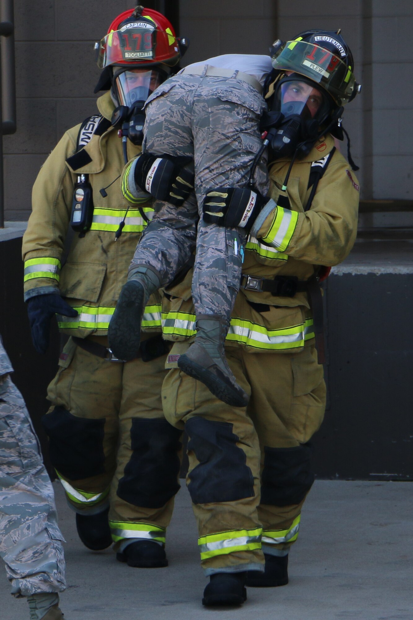 Airmen of the Ohio Air National Guard work with the Richland County Emergency Management Agency (EMA) during an exercise at the 179th Airlift Wing, Mansfield, OH, April 29, 2015. The county-wide hazardous material response exercise evaluates coordination of law enforcement, fire departments and emergency service agencies from the local area working together in a joint scenario. (U.S. Air National Guard Photo by Tech. Sgt. Joe Harwood\Released)