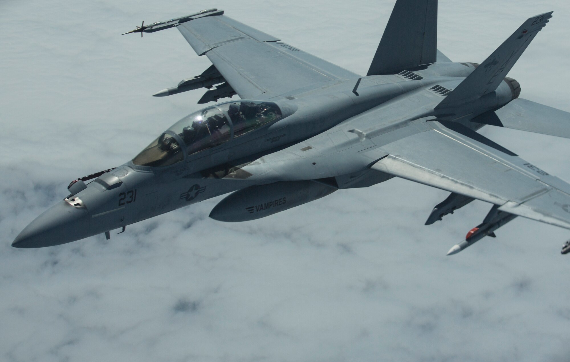 A U.S. Navy F/A-18 Super Hornet aircraft, assigned to Air Test and Evaluation Squadron 9, Commander Operational Test and Evaluation Force, flies over the Gulf of Alaska, June 22, 2015. The aircraft was being refueled while flying a training mission during Exercise Northern Edge 15. Northern Edge is Alaska’s premier joint training exercise designed to practice operations, techniques and procedures as well as enhance interoperability among the services. Thousands of Airmen, Soldiers, Sailors, Marines and Coast Guardsmen from active duty, reserve and National Guard units are involved. (U.S. Marine Corps photo by Staff Sgt. Jeffrey D. Anderson/ Released)