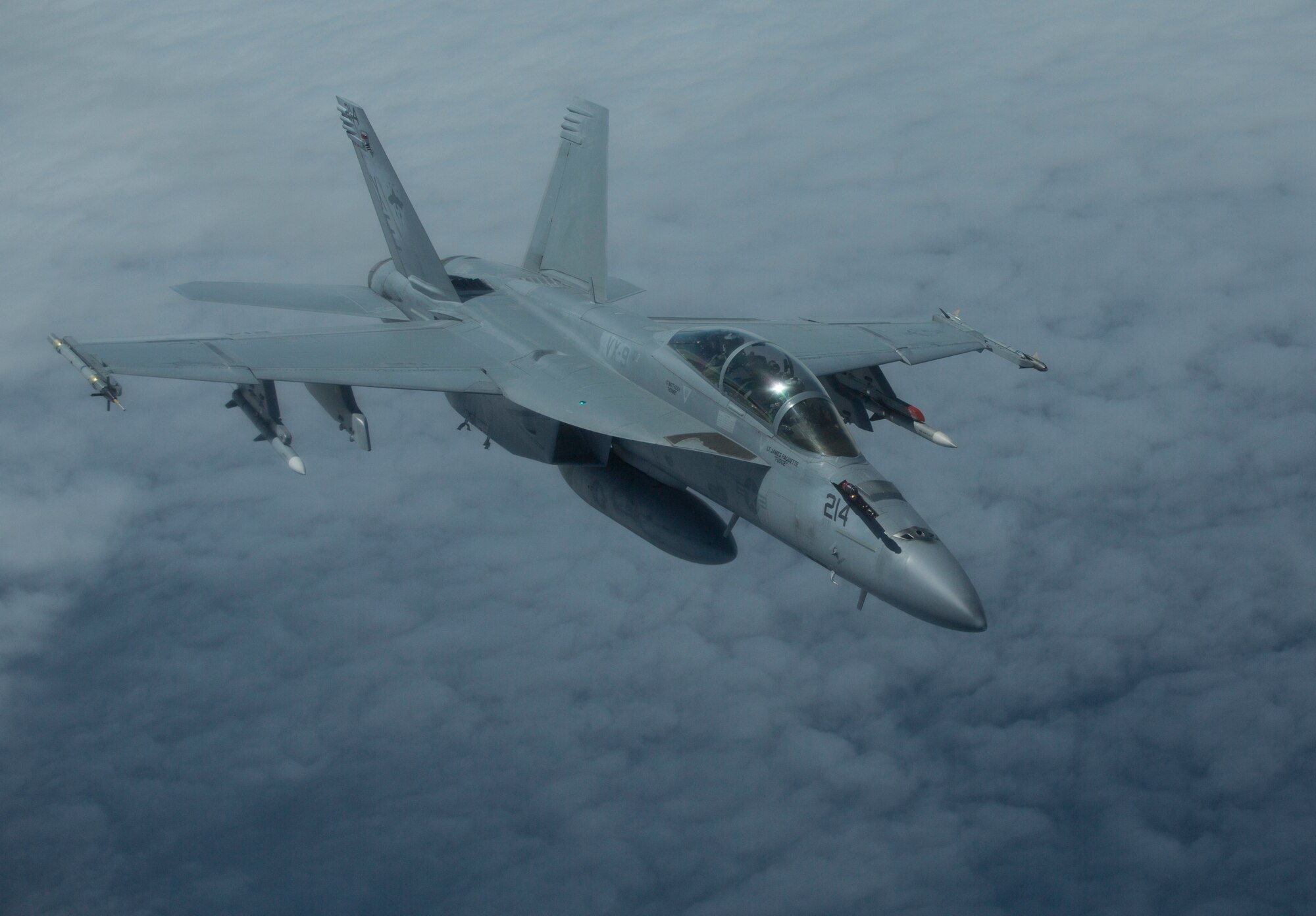 A U.S. Navy F/A-18 Super Hornet aircraft, assigned to Air Test and Evaluation Squadron 9, Commander Operational Test and Evaluation Force, flies over the Gulf of Alaska, June 22, 2015. The aircraft was being refueled while flying a training mission during Exercise Northern Edge 15. Northern Edge is Alaska’s premier joint training exercise designed to practice operations, techniques and procedures as well as enhance interoperability among the services. Thousands of Airmen, Soldiers, Sailors, Marines and Coast Guardsmen from active duty, reserve and National Guard units are involved. (U.S. Marine Corps photo by Staff Sgt. Jeffrey D. Anderson/ Released)