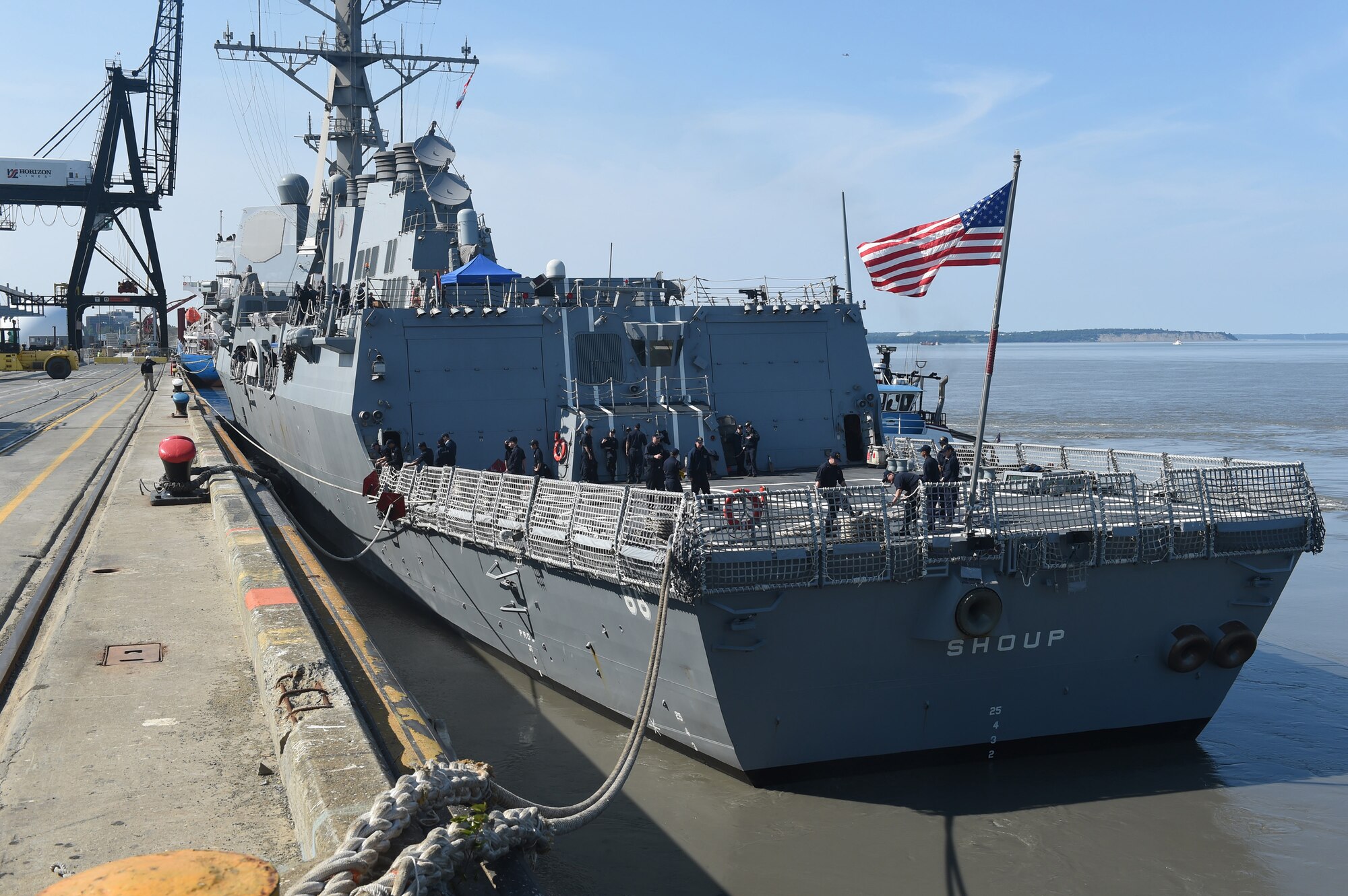Crew members of the USS Shoup (DDG 86) prepare to moor at the Port of Anchorage, Alaska, June 24, 2015. The Shoup is one of three U.S. Navy destroyers participating in Exercise Northern Edge out of the Gulf of Alaska. Thousands of service members from all the branch services including active duty, Reserve and National Guard units participated. (U.S. Navy photo/Chief Mass Communication Specialist Larry Foos)