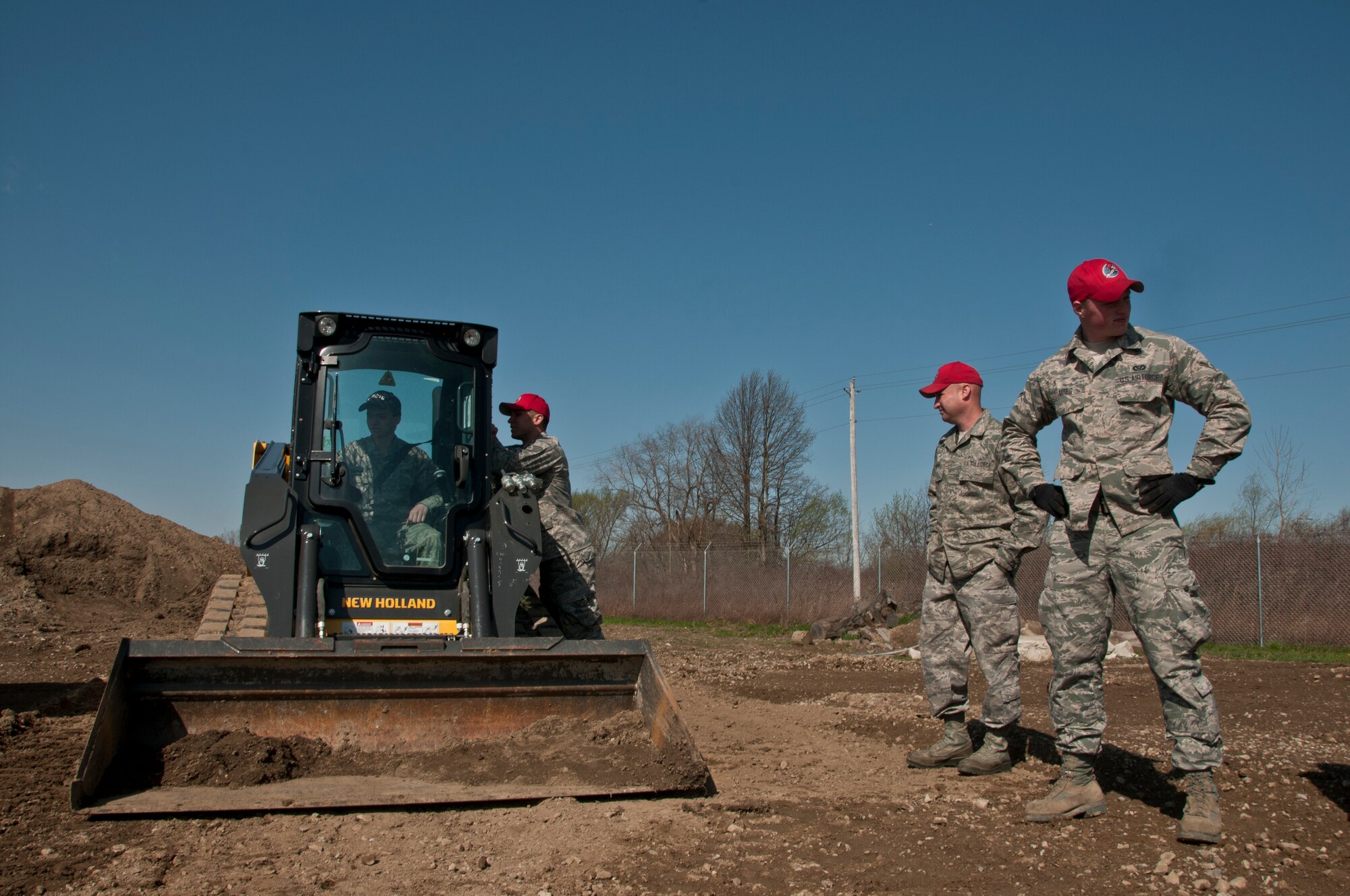 200th RED HORSE members help cadets of the Junior Reserve Officer Training Corps (AF JROTC) from Knox County, operate some of the equipment while visiting the 200th RED HORSE, Detachment 1, Mansfield, OH, April 21, 2014.  The cadets got a chance to tour the facility, learn about the mission and get hands on with equipment. (U.S. Air National Guard Photo by Tech. Sgt. Joe Harwood\Released)