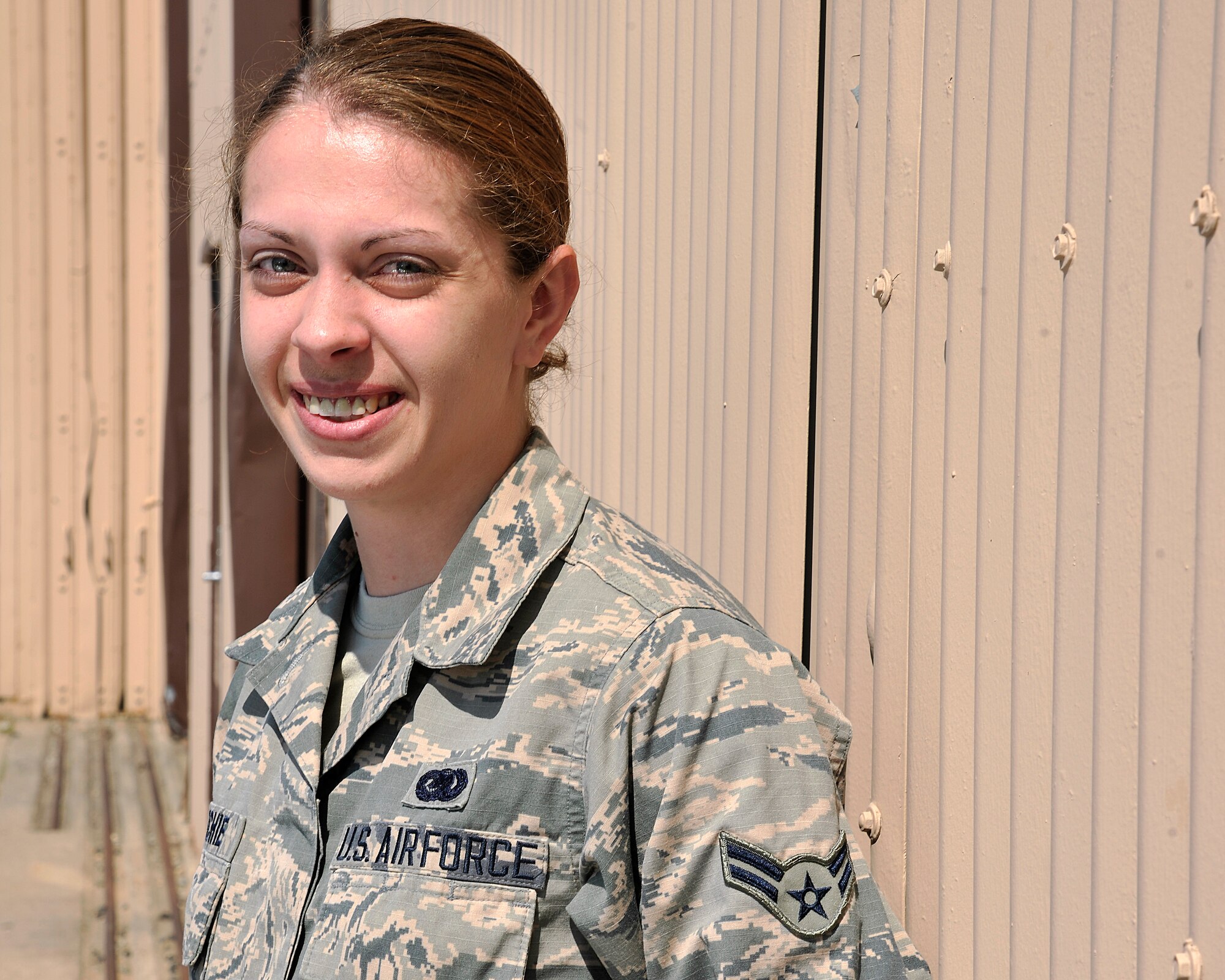 Airman 1st Class Diamand Ritchie, 319th Logistics Readiness Squadron logistics planner apprentice, stands in front of building 523 June 25, 2015 on Grand Forks Air Force Base, N.D. Ritchie, an Auburn native, was selected as the Warrior of the Week for the last week of June 2015. (U.S. Air Force photo by Senior Airman Xavier Navarro/released)