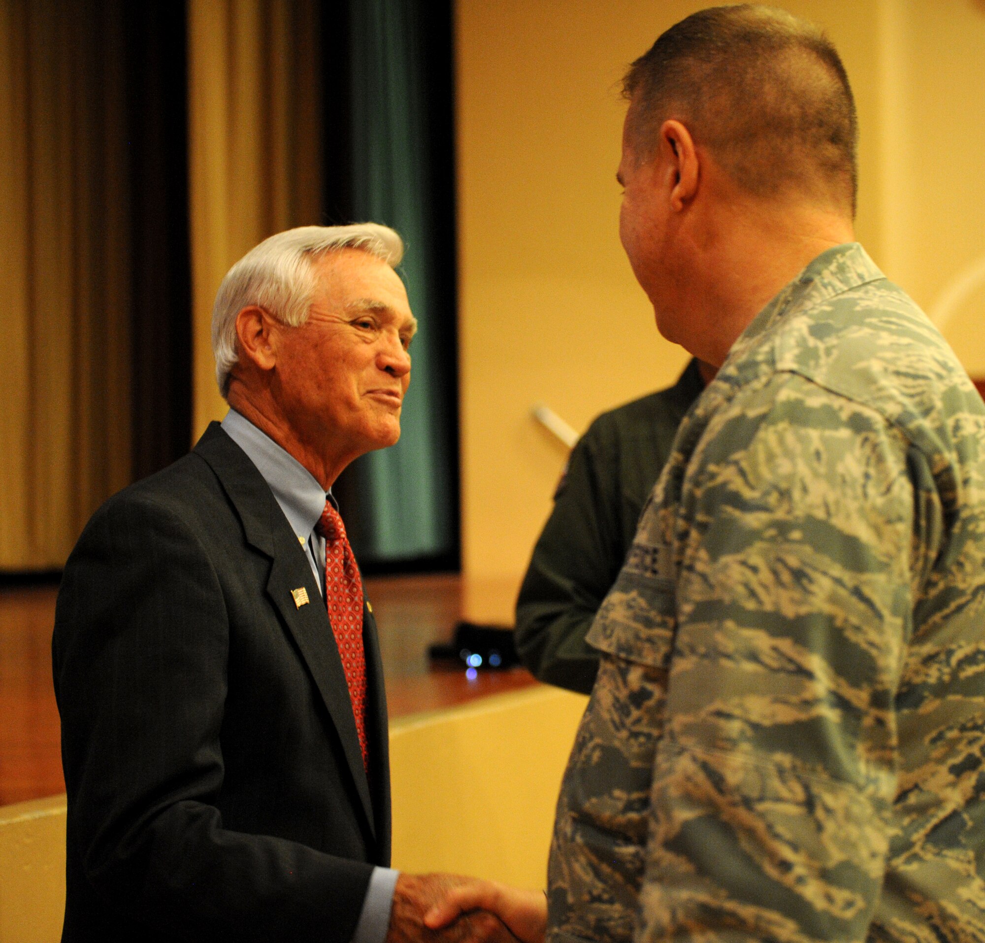 Barry Bridges (left), retired Air Force Vietnam veteran, shakes the hand of Lt. Col. Francis Lowe, 9th Reconnaissance Wing chaplain, on June, 23 2015, at Beale Air Force Base, California. Bridges shared his experiences in captivity at the “Hanoi Hilton” prison camp in North Vietnam after being shot down in 1967.