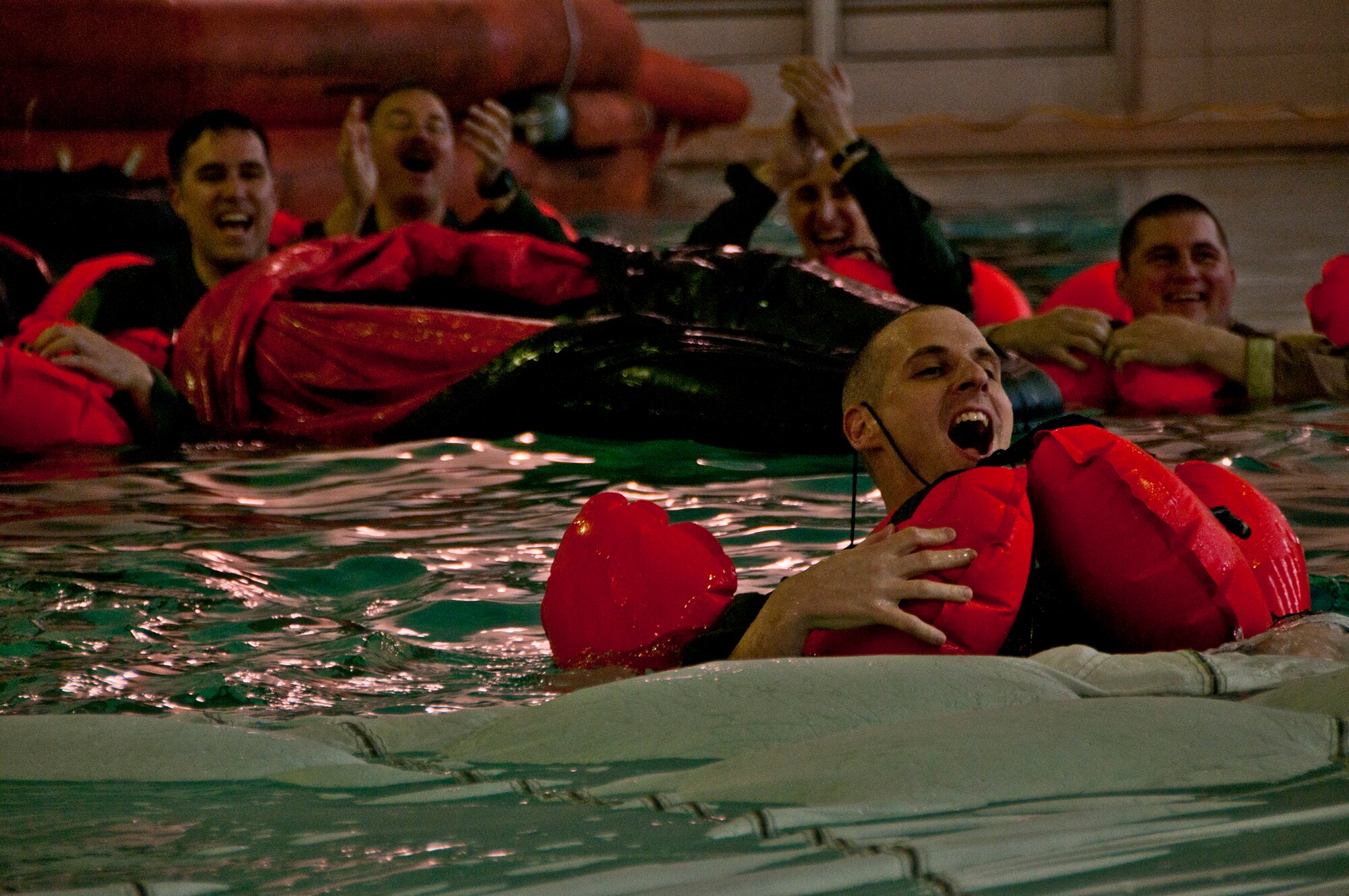 Members of the 164th Airlift Squadron, Mansfield, Ohio, perform annual water survival refresher training April 12, 2015, at the YMCA in Galion, Ohio. The 275th Akron Canton Flying Squadron of the Civil Air Patrol joined the training for the first time. (U.S. Air National Guard Photo by Tech. Sgt. Joe Harwood\Released)