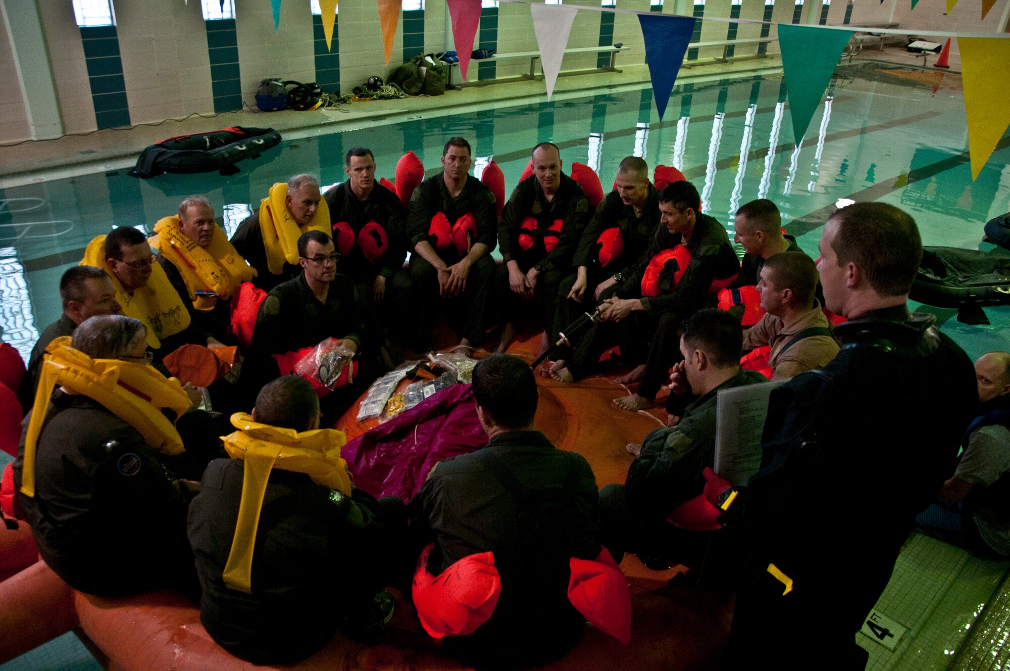 Members of the 164th Airlift Squadron, Mansfield, Ohio, perform annual water survival refresher training April 12, 2015, at the YMCA in Galion, Ohio. The 275th Akron Canton Flying Squadron of the Civil Air Patrol joined the training for the first time. (U.S. Air National Guard Photo by Tech. Sgt. Joe Harwood\Released)