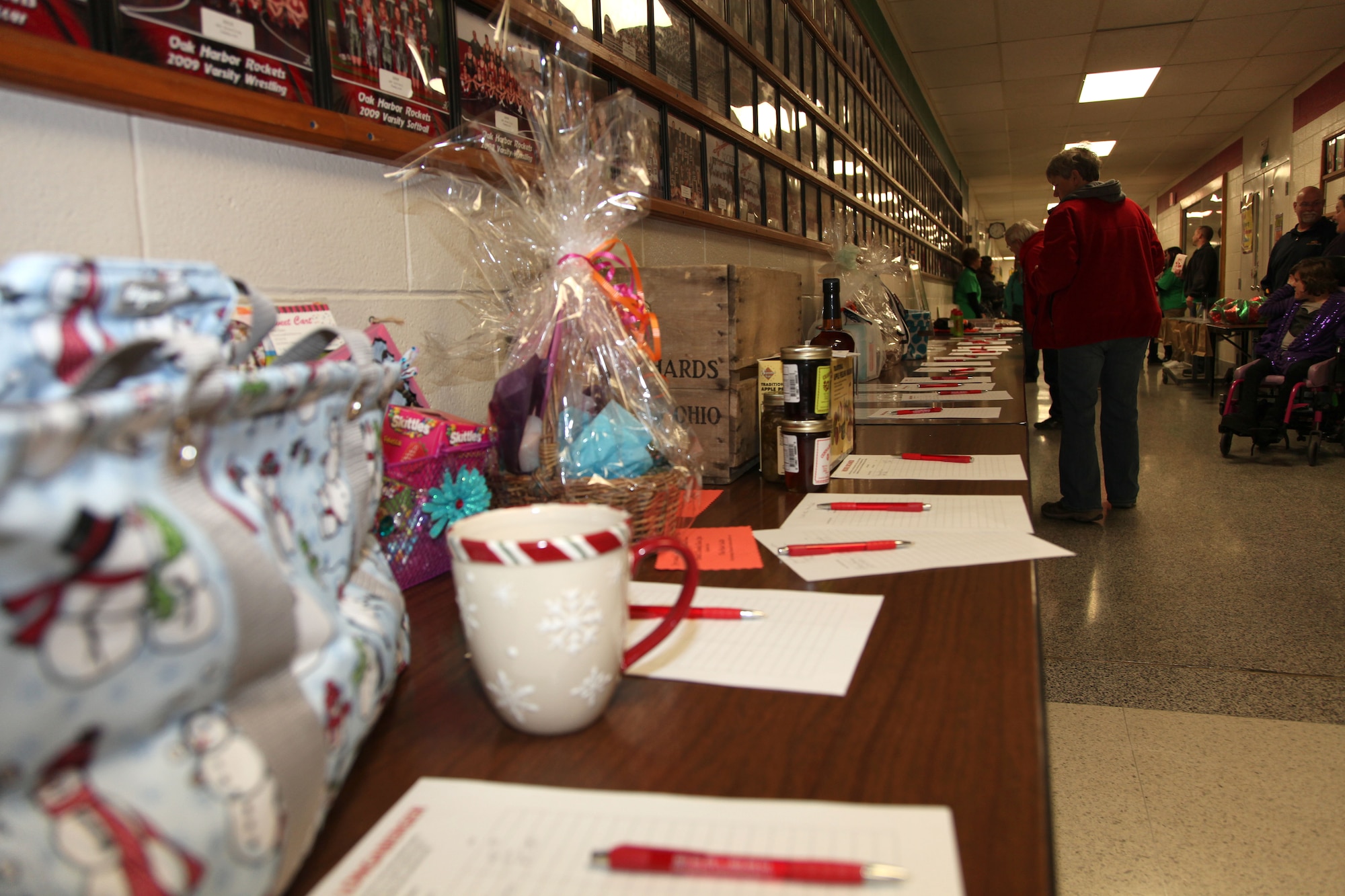 Donations, bake sales and 50/50 tickets were sold to support the United Way during the Ottawa County Board of Developmental Disabilities basketball tournament, Camp Perry, OH, Mar. 23, 2015. Five RED HORSE members along with two Special Olympic players participated in three, 12 minute games, at Oak Harbor High School Auditorium to support the United Way of Ottawa County.(U.S. Air National Guard Photo by Master Sgt. Lisa Haun\Released)
