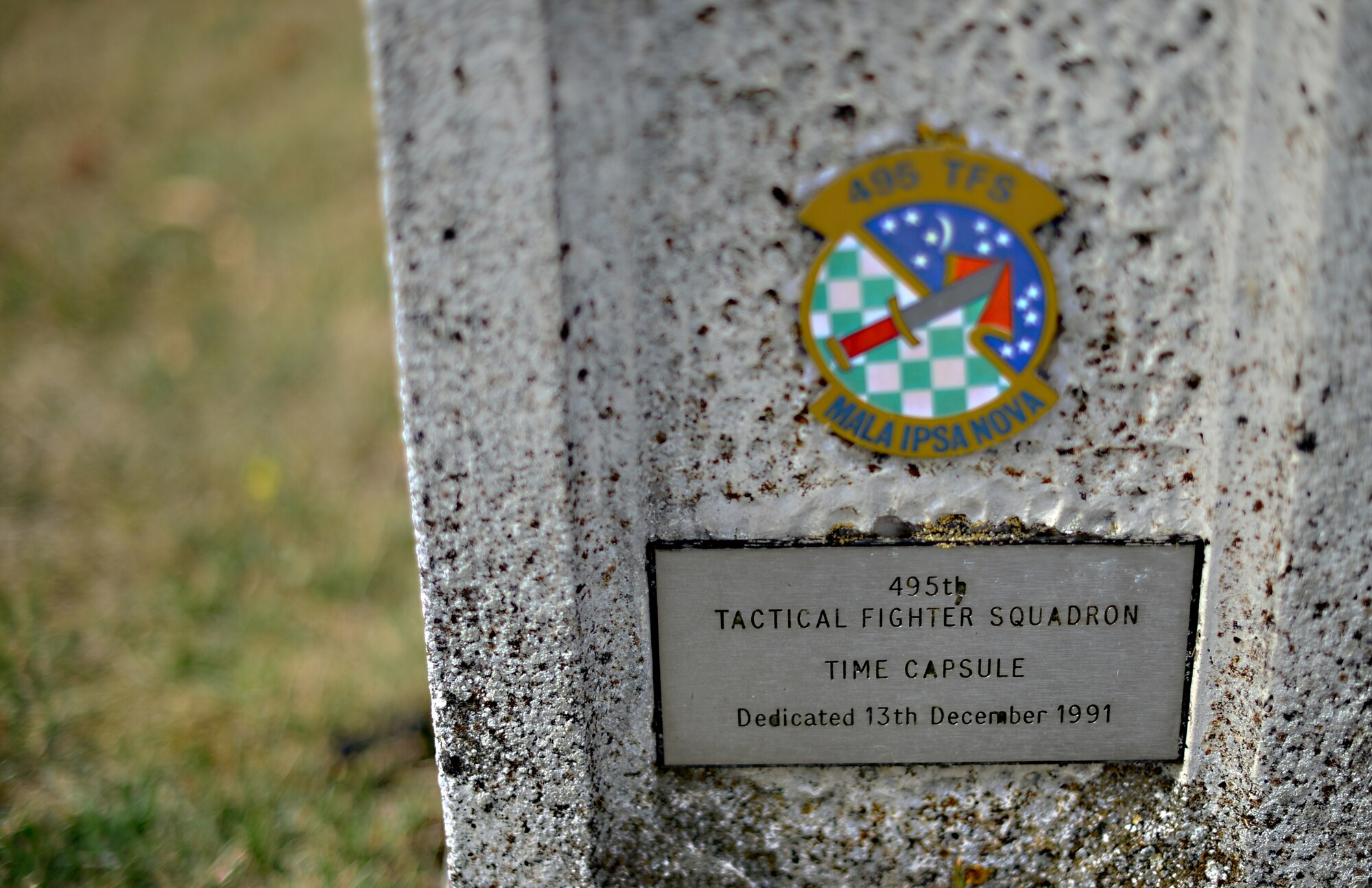 A time capsule memorial dedicated to Royal Air Force Lakenheath’s once active 495th Tactical Fighter Squadron, was placed at RAF Lakenheath, England, Dec. 13, 1991. Activated in 1977, the squadron functioned as a replacement training unit for the Liberty Wing’s 492nd, 493rd and 494th Fighter Squadrons that are still active today. (U.S. Air Force photo by Senior Airman Erin O’Shea/Released)
