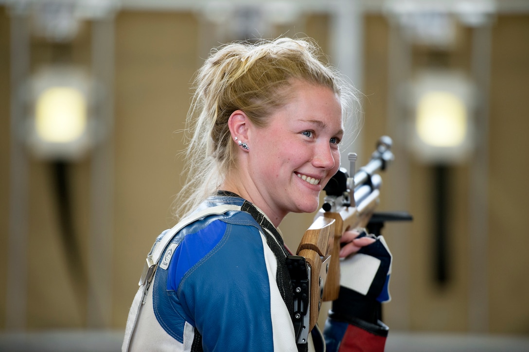 Army Reserve Spc. Chasity Kuczer reacts to hearing her scores during a marksmanship competition during the Army Trials for the 2015 Department of Defense Warrior Games March 30, 2015 at Fort Bliss in El Paso, Texas, March 30, 2015. Athletes in the trials competed for a spot on the Army’s team in the 2015 Department of Defense Warrior Games. DoD photo by EJ Hersom