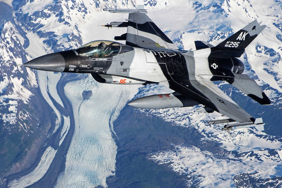 A U.S. Air Force F-16 Fighting Falcon flies over the Joint Pacific Alaska Range Complex during a training mission as part of Exercise Northern Edge 15, June 16, 2015. The pilot is assigned to the 354th Fighter Wing, Eielson Air Force Base, Alaska.