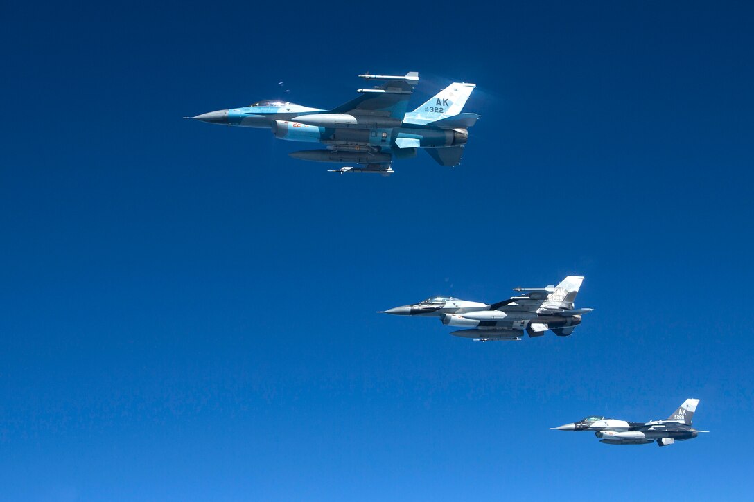 U.S. Air Force F-16 Fighting Falcons conduct a training mission over the Gulf of Alaska, June 16, 2015, during Exercise Northern Edge 15. 