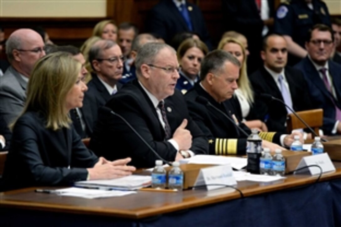 Deputy Defense Secretary Bob Work, center, Navy Adm. James A. Winnefeld Jr., right, vice chairman of the Joint Chiefs of Staff, and Deputy Energy Secretary Elizabeth Sherwood-Randall testify on nuclear deterrence before the House Armed Services Committee in Washington, D.C., June 25, 2015. 
