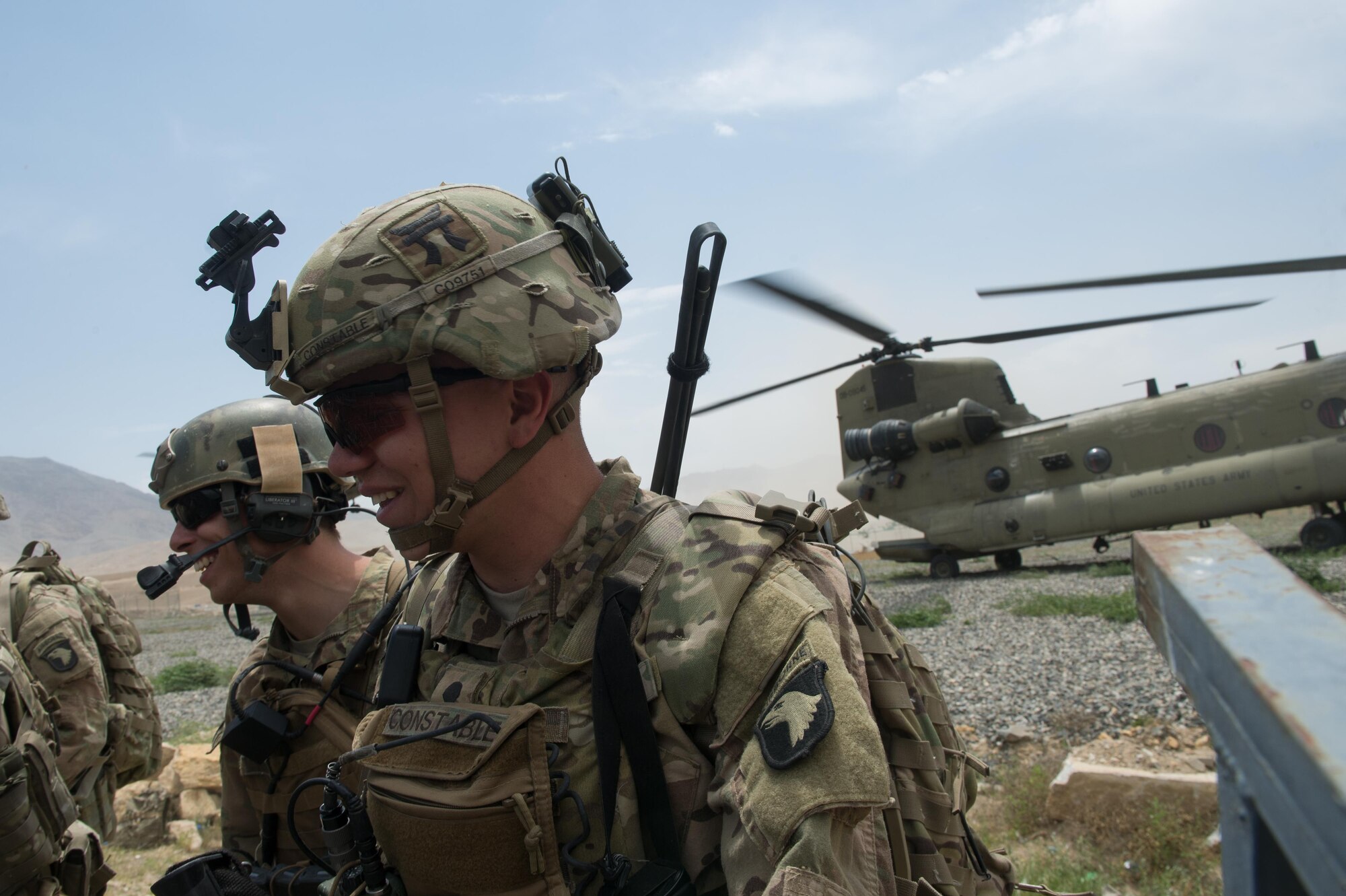 A U.S. Army CH-47 Chinook helicopter prepares to land and pick up Air Force Senior Airman Grant Haefke, a Joint Terminal Attack Controller qualified Tactical Air Control Party Airman assigned to the 817th Expeditionary Air Support Operations Squadron, and Soldiers assigned to the 3rd Battalion, 187th Infantry Regiment (Iron Rakkasans), 101st Airborne Division (Air Assault) from an Afghan National Army combat outpost in Afghanistan, June 23, 2015.  Haefke and the Soldiers supported a NATO Resolute Support Train Advise Assist Command-Air mission.  (U.S. Air Force photo by Tech. Sgt. Joseph Swafford/Released)