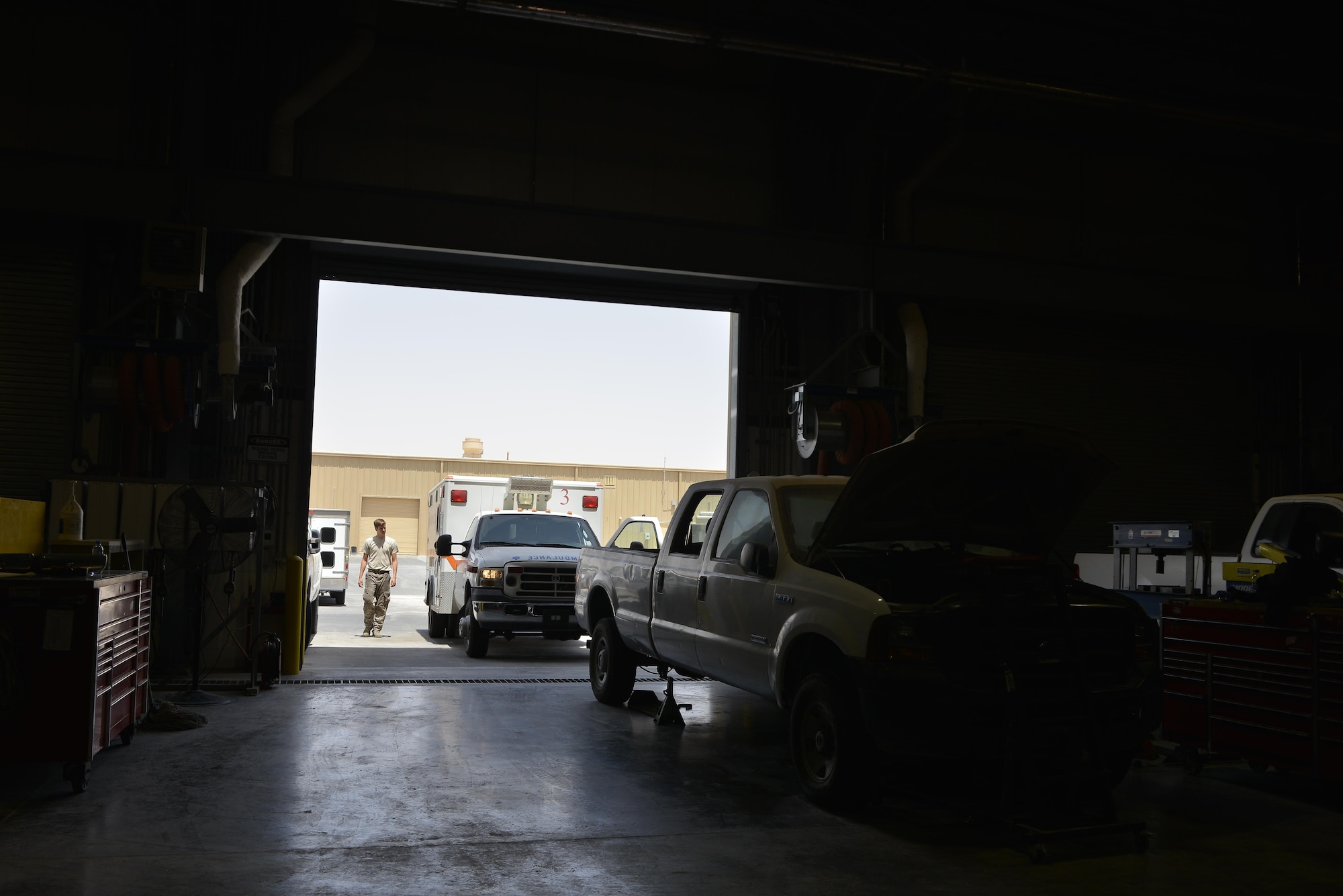 Airman from the 379th Expeditionary Logistics Readiness Squadron vehicle maintenance shop service over 1,000 government owned vehicles that directly support the mission ranging from small sedans, buses, aircraft and structural support vehicles. (U.S. Air Force photo/ Staff Sgt. Alexandre Montes)  