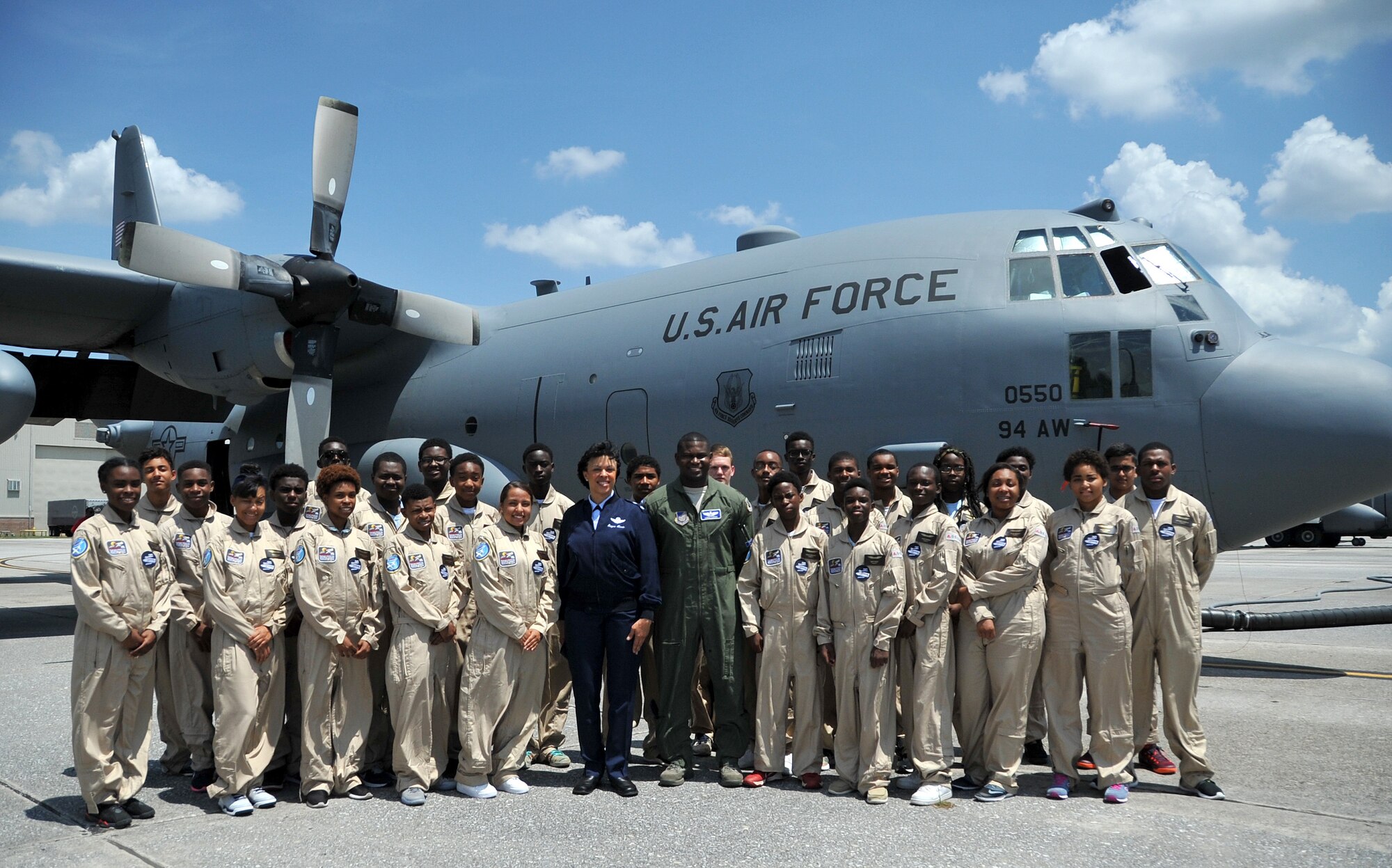 Maj. Gen. Stayce Harris, 22nd Air Force commander, poses with Tuskegee Airmen Aviation Career Training Cadets during their tour at Dobbins Air Reserve Base, Ga. on June 25, 2015.  The tours are part of a vocation preparation program designed to give youth an opportunity to explore career fields in aviation. (U.S. Air Force photo/Tech. Sgt. Karla V. Lehman)