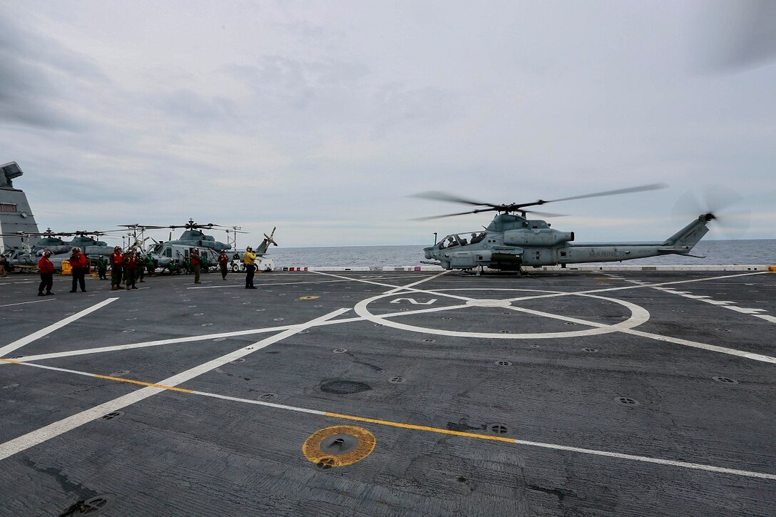 An AH-1Z Viper with Marine Medium Tiltrotor Squadron 161 (Reinforced), 15th Marine Expeditionary Unit, launches from the USS Anchorage (LPD 23) at sea in the Indian Ocean, June 16, 2015.  The Anchorage houses hundreds of Marines and Sailors training constantly to ensure they are prepared for any situation during their deployment. (U.S. Marine Corps photo by Sgt. Jamean Berry/Released)