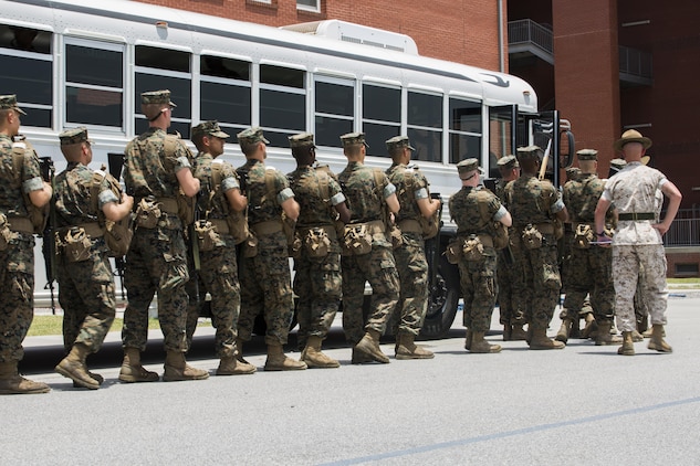 Recruits of Lima Company, 3rd Recruit Training Battalion, practice hurricane evacuation procedures June 24, 2015, on Parris Island, S.C. The practiced evacuation was part of a hurricane exercise that simulated the efforts needed to evacuate permanent personnel, recruits and equipment. After the week-long exercise, officials will review the outcome and apply any necessary changes to ensure Parris Island can continue making Marines regardless of what mother nature throws at the Lowcountry.