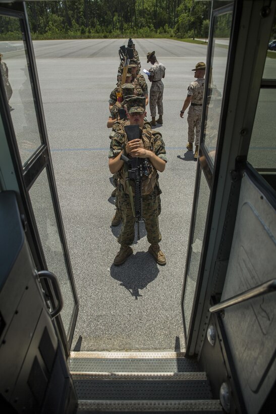 Recruits of Lima Company, 3rd Recruit Training Battalion, practice hurricane evacuation procedures June 24, 2015, on Parris Island, S.C. The practiced evacuation was part of a hurricane exercise that simulated the efforts needed to evacuate permanent personnel, recruits and equipment. After the week-long exercise, officials will review the outcome and apply any necessary changes to ensure Parris Island can continue making Marines regardless of what mother nature throws at the Lowcountry.