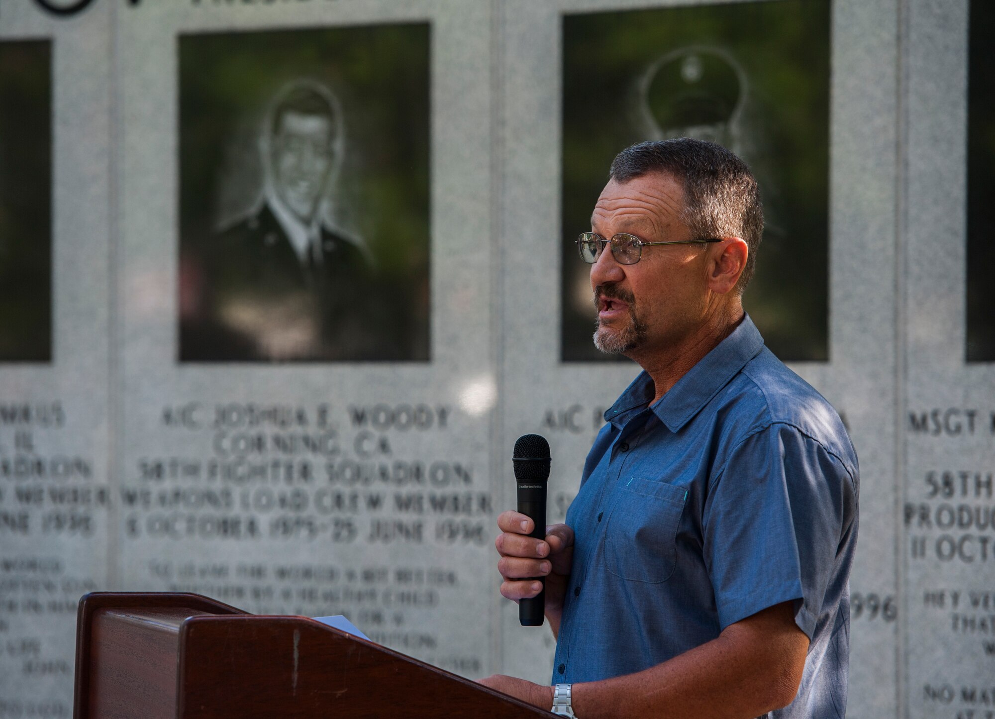 Tech. Sgt. (retired) David Westrup, 58th Fighter Squadron crew chief, addresses the audience as the guest speaker during the 19th anniversary Khobar Tower memorial ceremony, June 25, 2015, on Eglin Air Force Base, Florida. The 12 Nomads honored at the ceremony were members of the 58th Fighter Squadron, 60th Fighter Squadron, 33rd Logistics Group, 33rd Maintenance Squadron and the 33rd Operations Support Squadron. They represented a cross-section of the wing as crew chiefs, expeditors, weapons loaders, mechanics, production superintendents, program managers and technicians. The memorial here honoring the Nomads’ memory was dedicated a year after the tragedy. (U.S. Air Force photo/Staff Sgt. Marleah Robertson)