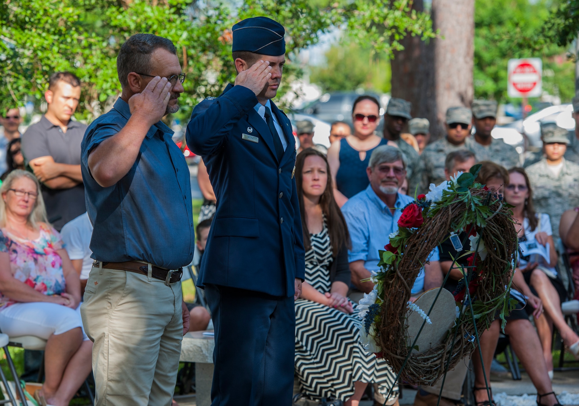 Tech. Sgt. (retired) David Westrup, left, 58th Fighter Squadron crew chief, and Col. Lance Pilch, 33rd Fighter Wing commander, render a salute during the 19th anniversary Khobar Tower memorial ceremony, June 25, 2015, on Eglin Air Force Base, Florida. The 12 Nomads honored at the ceremony were members of the 58th Fighter Squadron, 60th Fighter Squadron, 33rd Logistics Group, 33rd Maintenance Squadron and the 33rd Operations Support Squadron. They represented a cross-section of the wing as crew chiefs, expeditors, weapons loaders, mechanics, production superintendents, program managers and technicians. The memorial here honoring the Nomads’ memory was dedicated a year after the tragedy. (U.S. Air Force photo/Staff Sgt. Marleah Robertson)