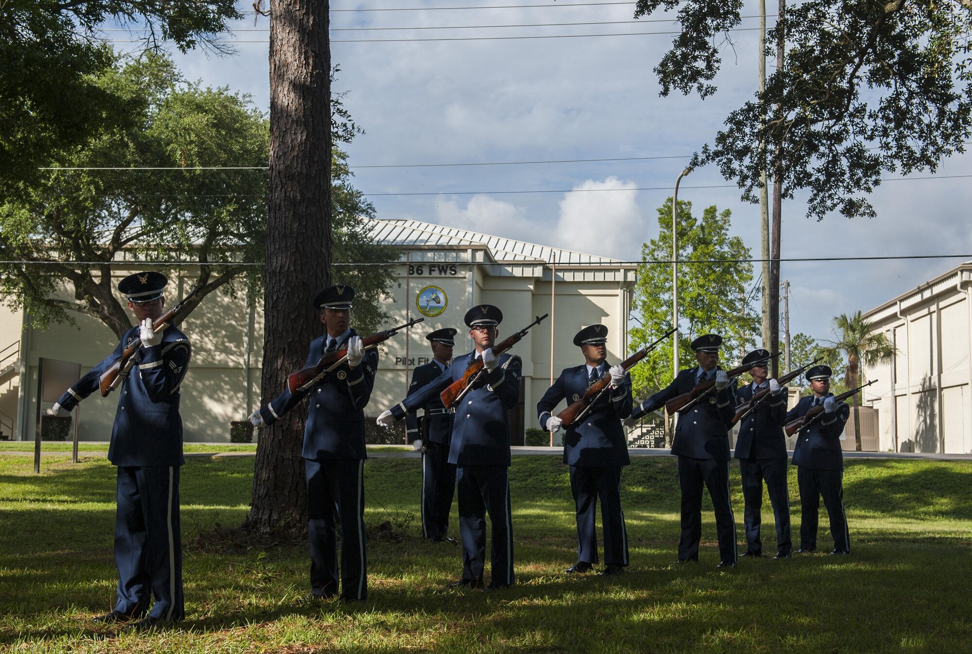 Members of the Eglin base honor guard perform a 21-gun salute during the 19th anniversary Khobar Tower memorial ceremony, June 25, 2015, on Eglin Air Force Base, Florida. On June 25, 1996, a truck-bomb was detonated adjacent to Khobar Tower in Dhahran, Saudi Arabia, that resulted in 400 injured U.S. and international military and civilian members. (U.S. Air Force photo/Staff Sgt. Marleah Robertson)