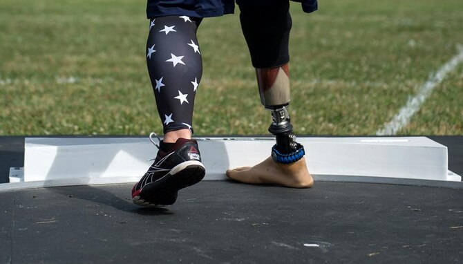 Retired Staff Sgt. Nicholas Dadgostar, an Air Force wounded warrior athlete, competes in the discus throw at the 2015 Department of Defense Warrior Games at the National Museum of the Marine Corps in Quantico, Va., June 23, 2015. The Warrior Games features athletes from throughout the Defense Department who compete in Paralympic-style events for their respective military branches. (U.S. Air Force Photo/Staff Sgt. Vernon Young Jr.)