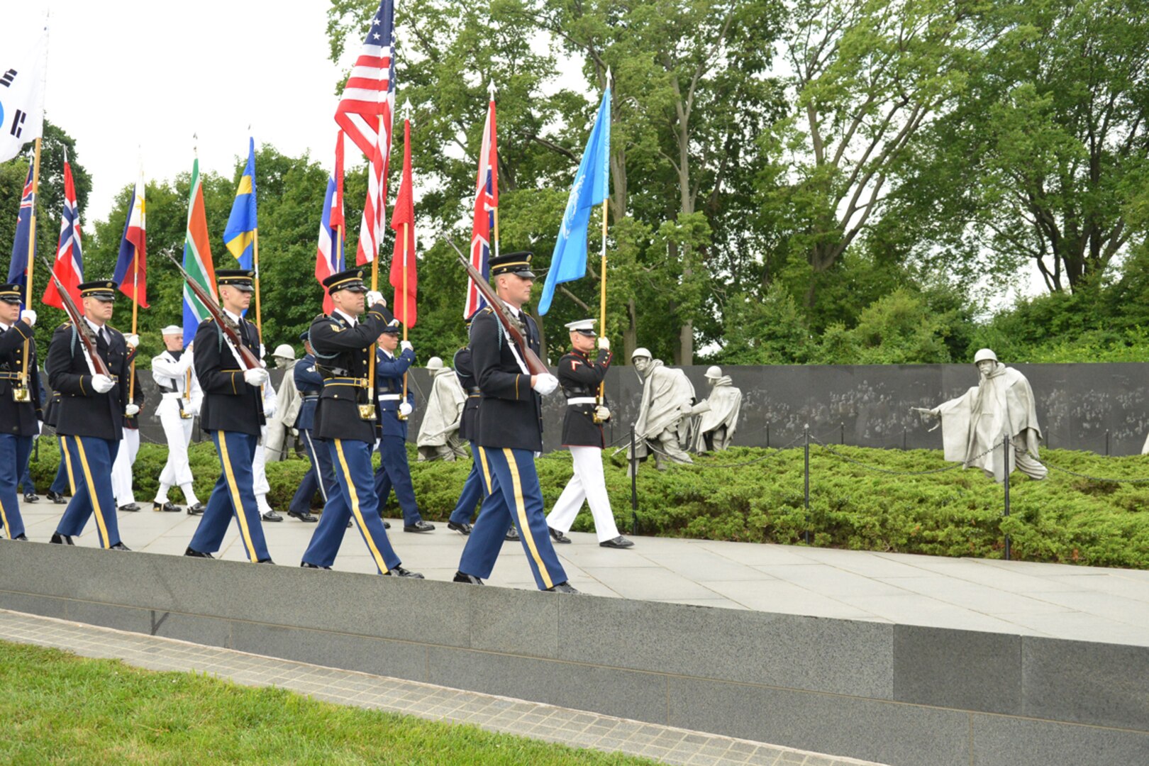 WASHINGTON (June 25, 2015) - U.S. service members from the National Capital Region provide support during a ceremony at the Korean War Memorial in Washington D.C., marking the beginning of the Korean War, 65 years ago. The event was co-produced by the U.S. Army Military District of Washington and the U.S. Park Service June 25, 2015. 