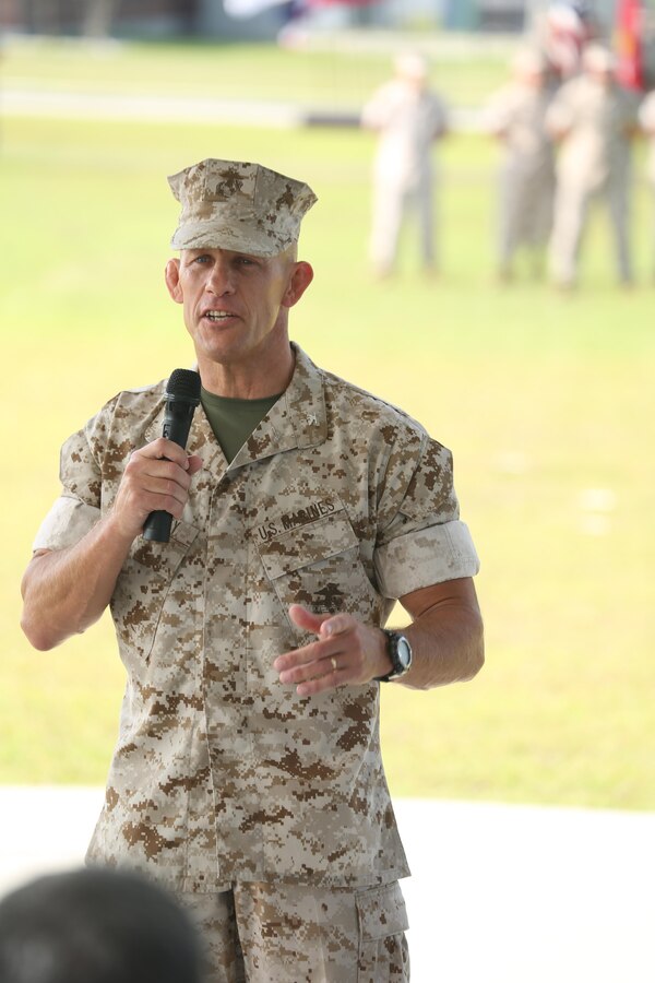 Colonel Peter Huntley, the Marine Raider Regiment commander, spoke briefly to the audience during a change of command ceremony at the Marine Corps Forces Special Operations Command headquarters at Stone Bay, aboard Marine Corps Base Camp Lejeune, N.C., June 26, 2015.