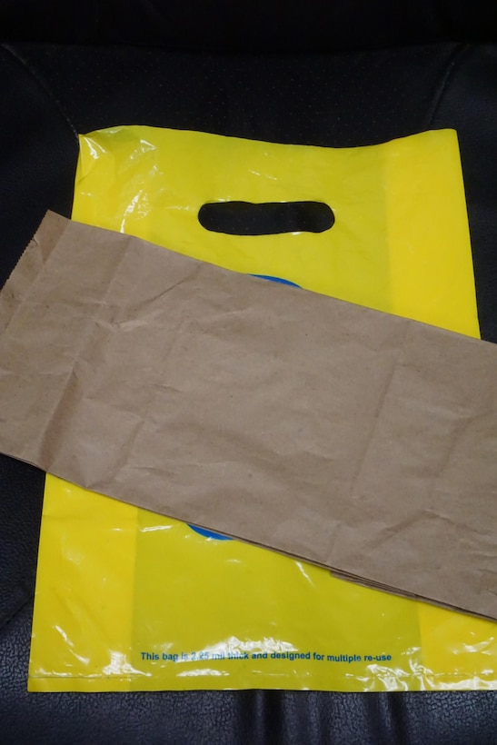 Oahu businesses will no longer be allowed to use non-recyclable plastic bags for checkout starting July 1, 2015, according to revisions approved by the Honolulu City Council in 2012. Businesses may offer compostable bags, reusable bags including those made of plastic that are thicker than 2.25 millimeters and recyclable paper bags. The ban does not include plastic bags provided to transport food or produce. (U.S. Marine Corps photo by Christine Cabalo)