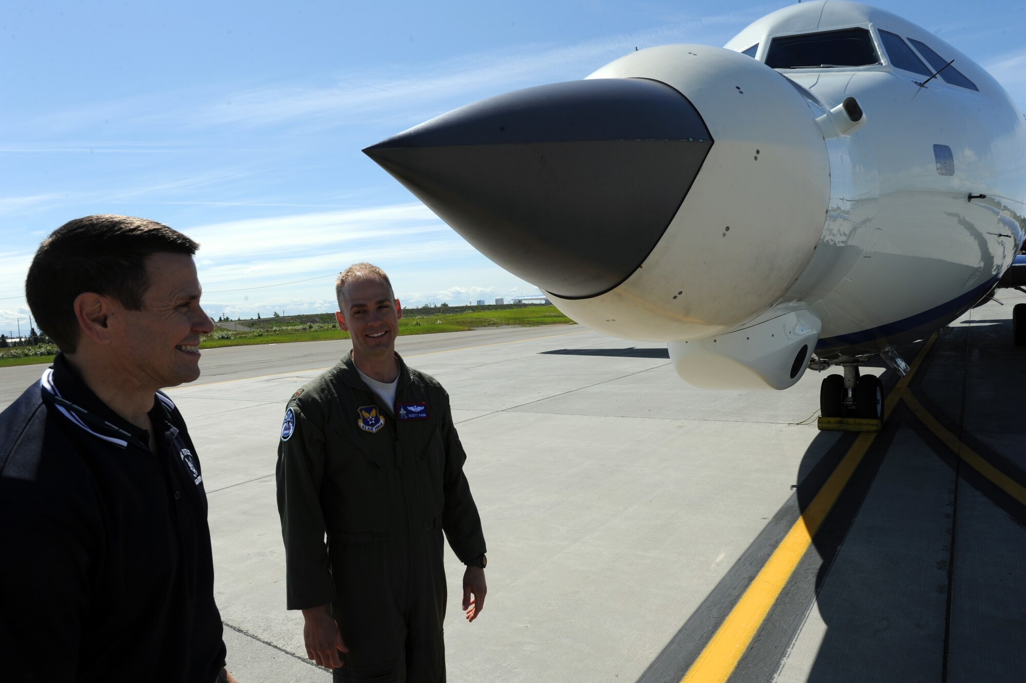 John Montgomery, Northrop Grumman fifth generation derivatives and improvements manager, and U.S. Air Force Major Scott Fann, F-35 Joint Program Office Air System Requirements current capabilities lead, discuss the BAC 1-11 test aircraft capabilities on Joint Base Elmendorf-Richardson, Alaska, during Northern Edge 2015, June 12, 2015. Northern Edge 15 is Alaska’s premier joint training exercise designed to practice operations, techniques and procedures as well as enhance interoperability among the services. Thousands of participants from all services; from active duty, Reserve and National Guard units are involved. (U.S. Air Force photo by Staff Sgt. William Banton/Released)‪