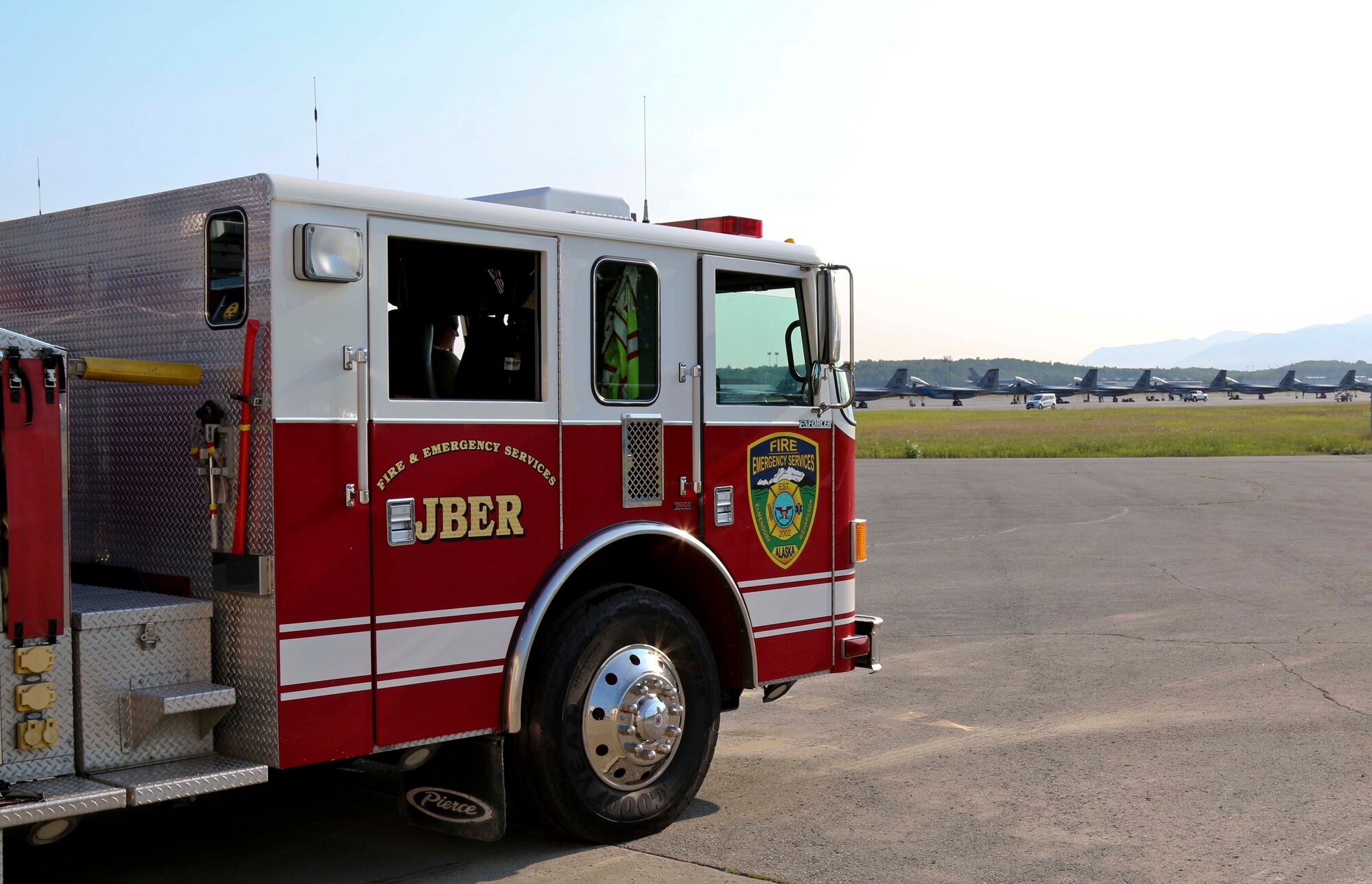 U.S. Air Force firefighters with 673rd Civil Engineer Squadron, answer a Flight Line 911 call during Exercise Northern Edge 2015 at Joint Base Elmendorf-Richardson, Alaska, June, 23 2015. NE15 is Alaska’s premier joint training exercise designed to practice operations, techniques and procedures as well as enhance interoperability among the services. Thousands of participants from all services from active duty, Reserve and National Guard units are involved. (U.S. Army photo by Sgt. Brian Ragin/Released)